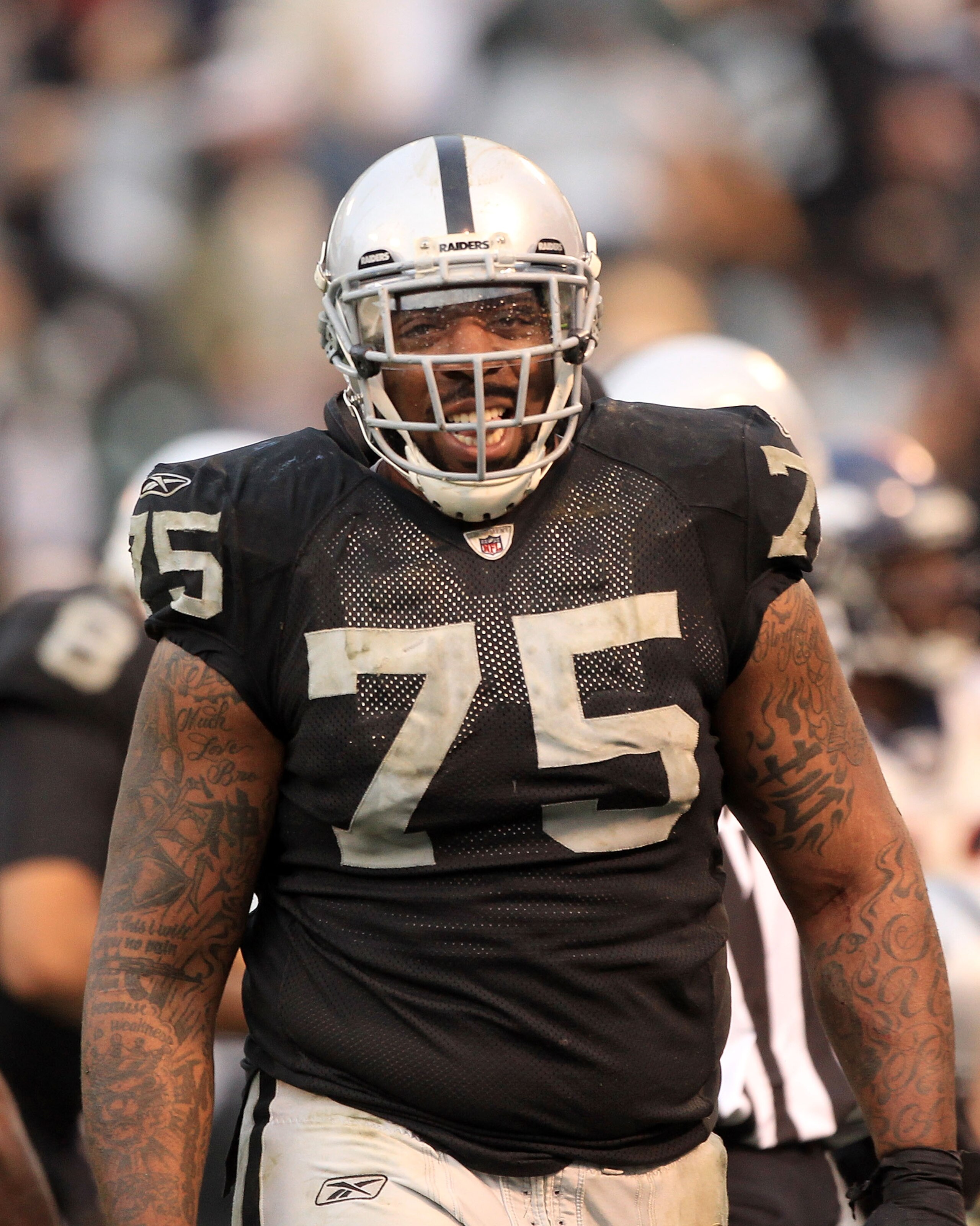 OAKLAND, CA - DECEMBER 19:  Mario Henderson #75 of the Oakland Raiders smiles during their game against the Denver Broncos at Oakland-Alameda County Coliseum on December 19, 2010 in Oakland, California.  (Photo by Ezra Shaw/Getty Images)