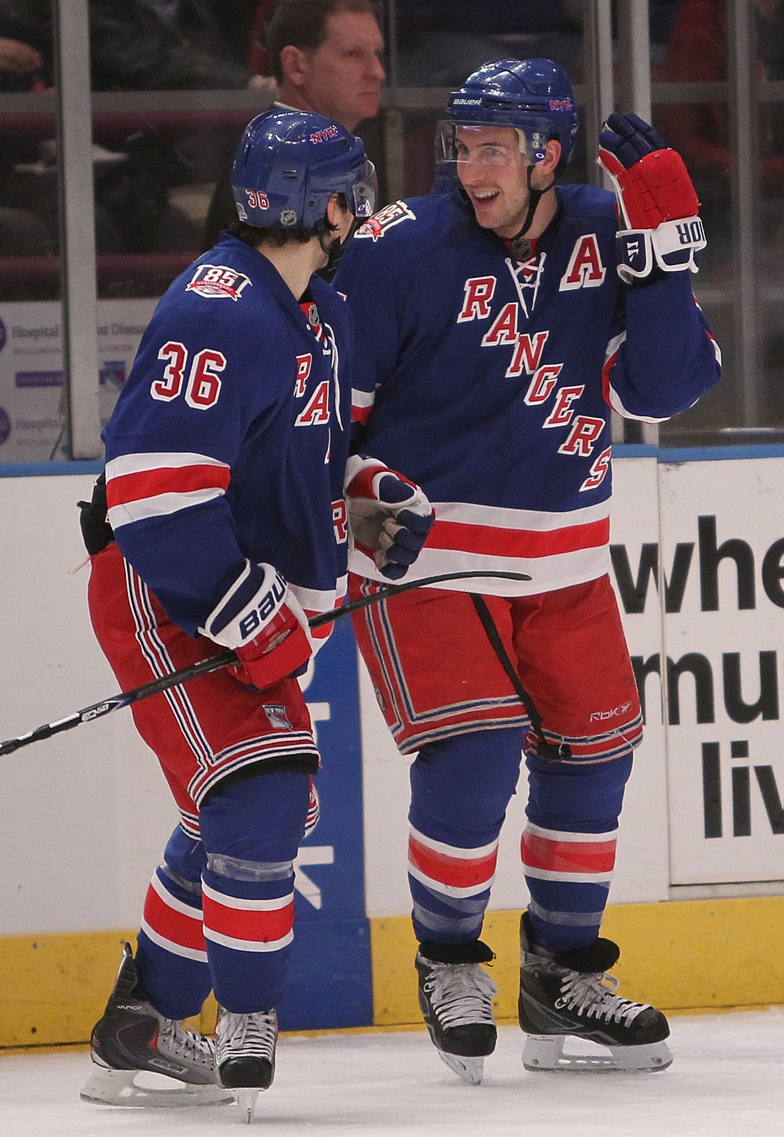 NEW YORK, NY - MARCH 01: Erik Christensen #26 (R) of the New York Rangers celebrates his goal with teammate Mats Zuccarello #36 against the Buffalo Sabres at Madison Square Garden on March 1, 2011 in New York City.  (Photo by Nick Laham/Getty Images)