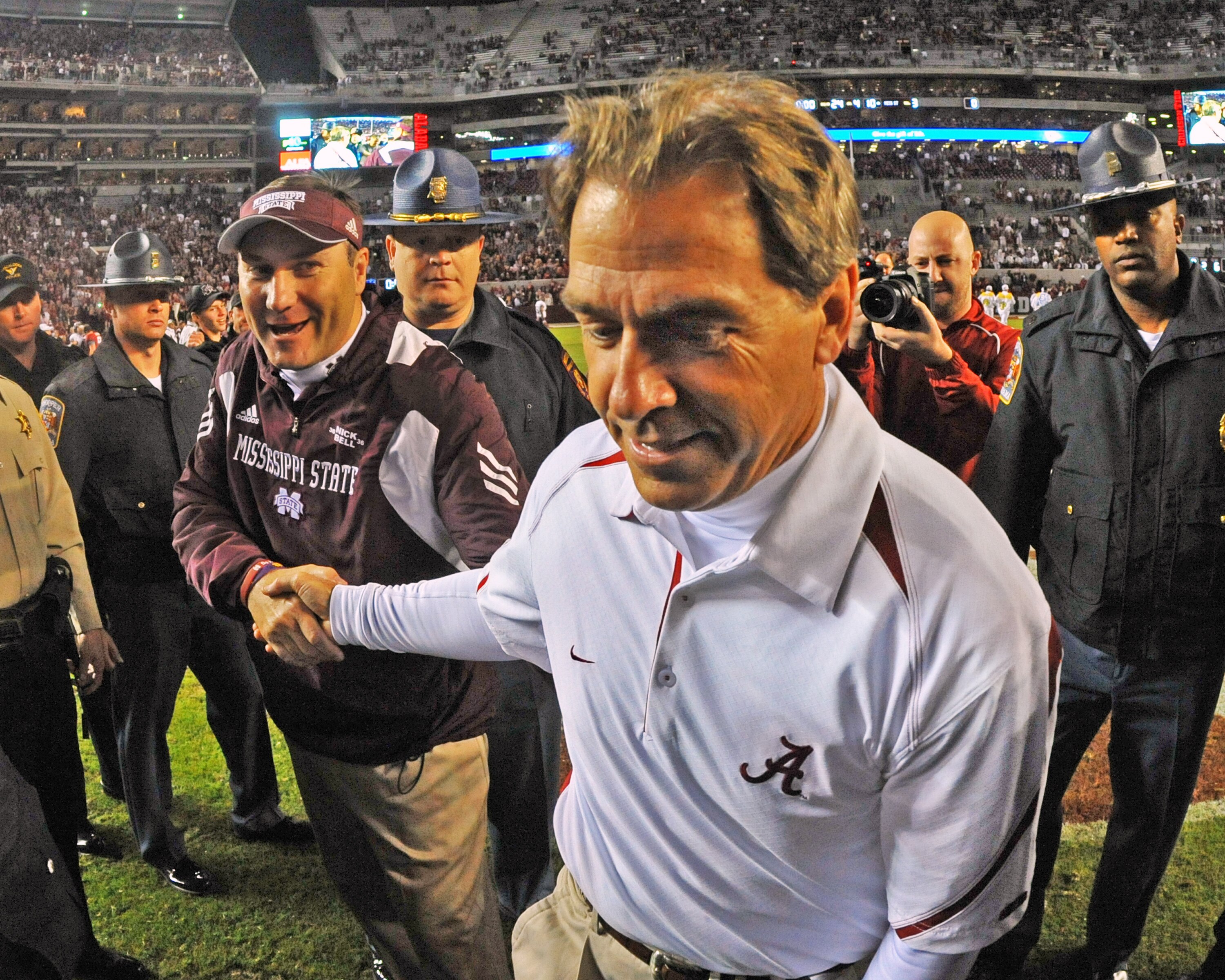 TUSCALOOSA, AL - NOVEMBER 13: Coach Dan Mullen of the Mississippi State Bulldogs shakes hands with coach Nick Saban of the Alabama Crimson Tide November 13, 2010 at Bryant-Denny Stadium in Tuscaloosa, Alabama.  (Photo by Al Messerschmidt/Getty Images)