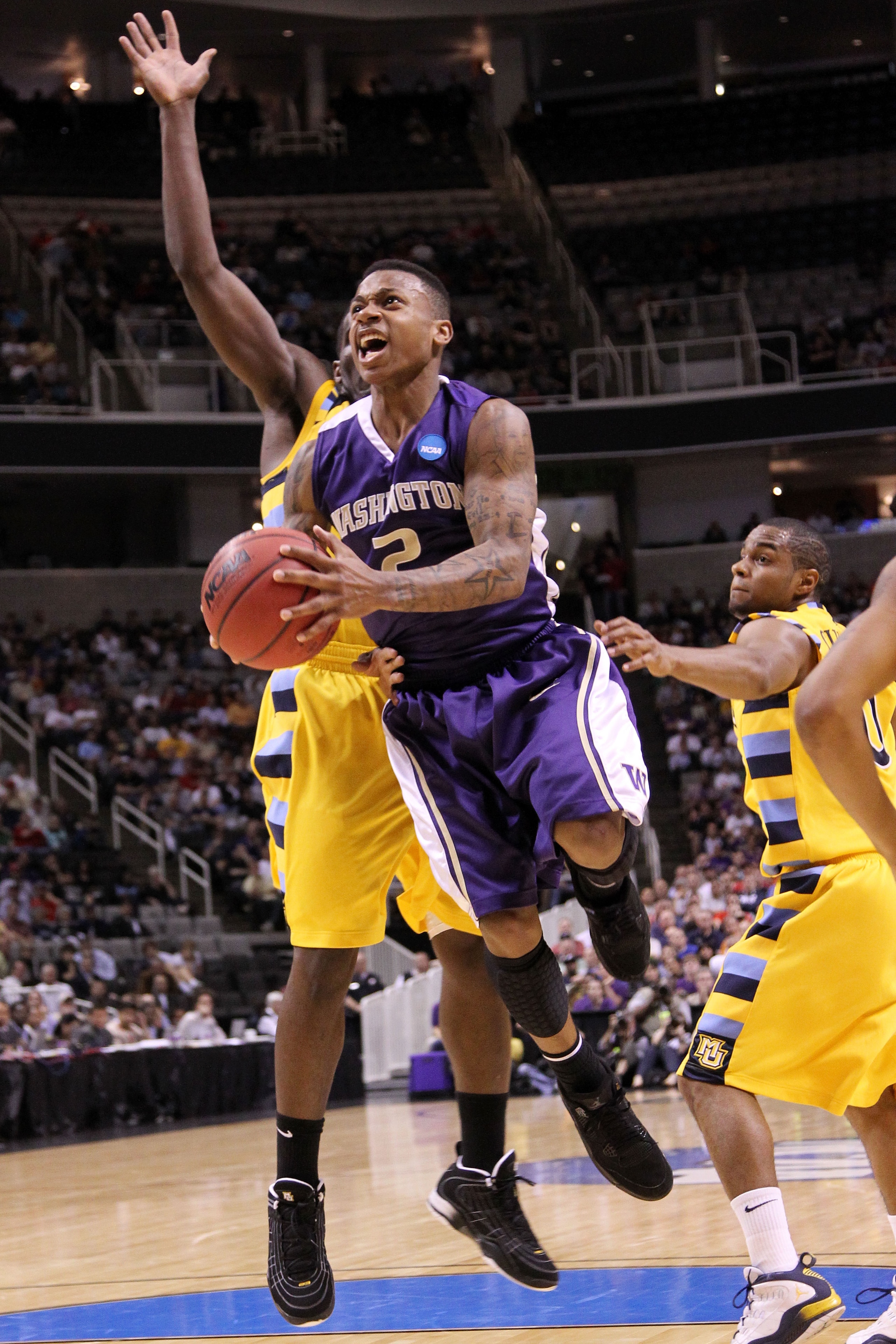 SAN JOSE, CA - MARCH 18:  Isaiah Thomas #2 of the Washington Huskies takes a shot against the Marquette Golden Eagles during the first round of the 2010 NCAA men's basketball tournament at HP Pavilion on March 18, 2010 in San Jose, California.  (Photo by