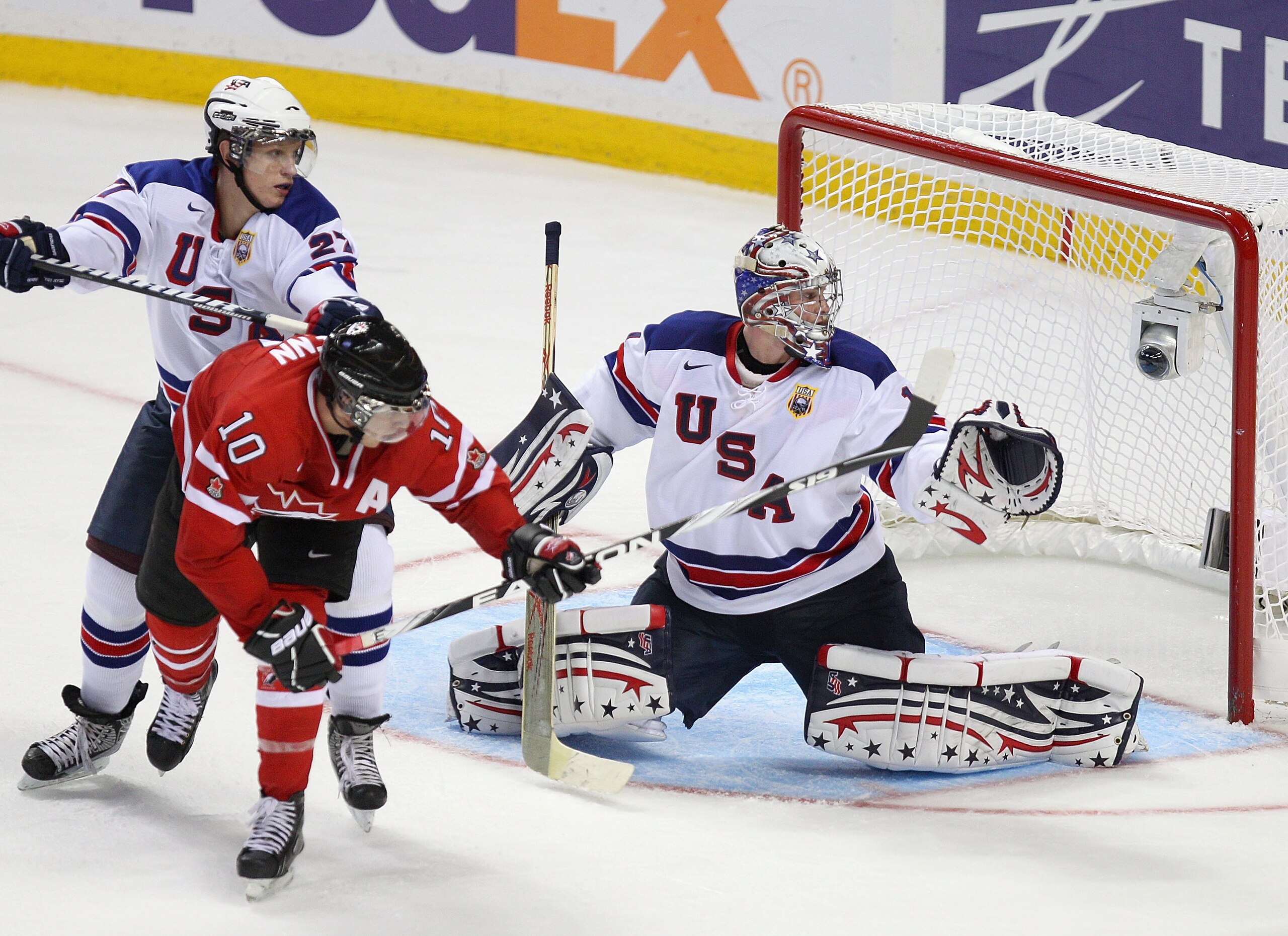 BUFFALO, NY - JANUARY 03: Jack Campbell #1 and Nick Bjugstad #27 of the United States defend against Brayden Schenn #10 of Canada during the 2011 IIHF World U20 Championship Semi Final game between United States and Canada on January 3, 2011 in Buffalo, N