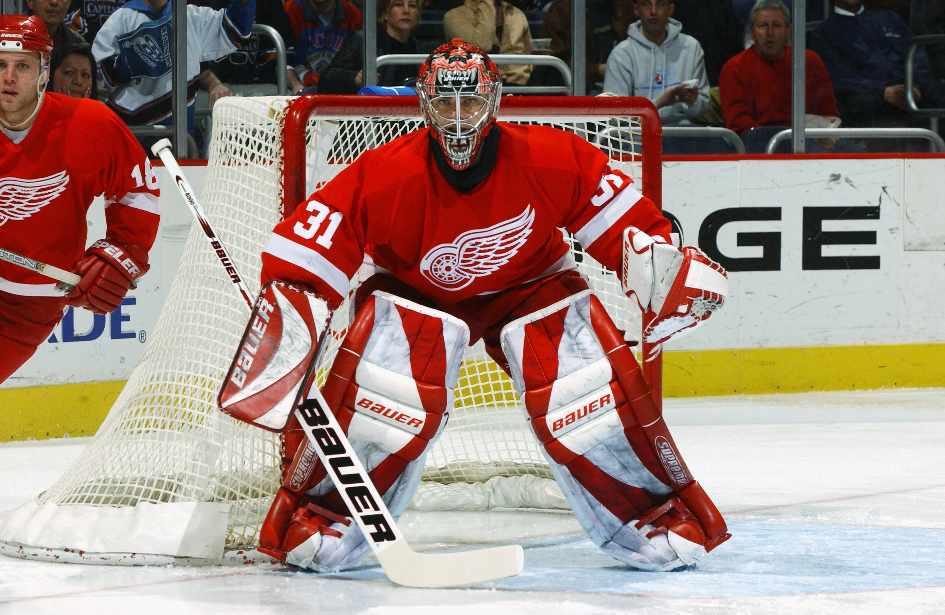 WASHINGTON - FEBRUARY 22:  Goalie Curtis Joseph #31 of the Detroit Red Wings protects the net during the game against the Washington Capitals at the MCI Center on Febuary 22, 2003 in Washington, DC. The Red Wings defeated the Capitals 5-1. (Photo by Mitch