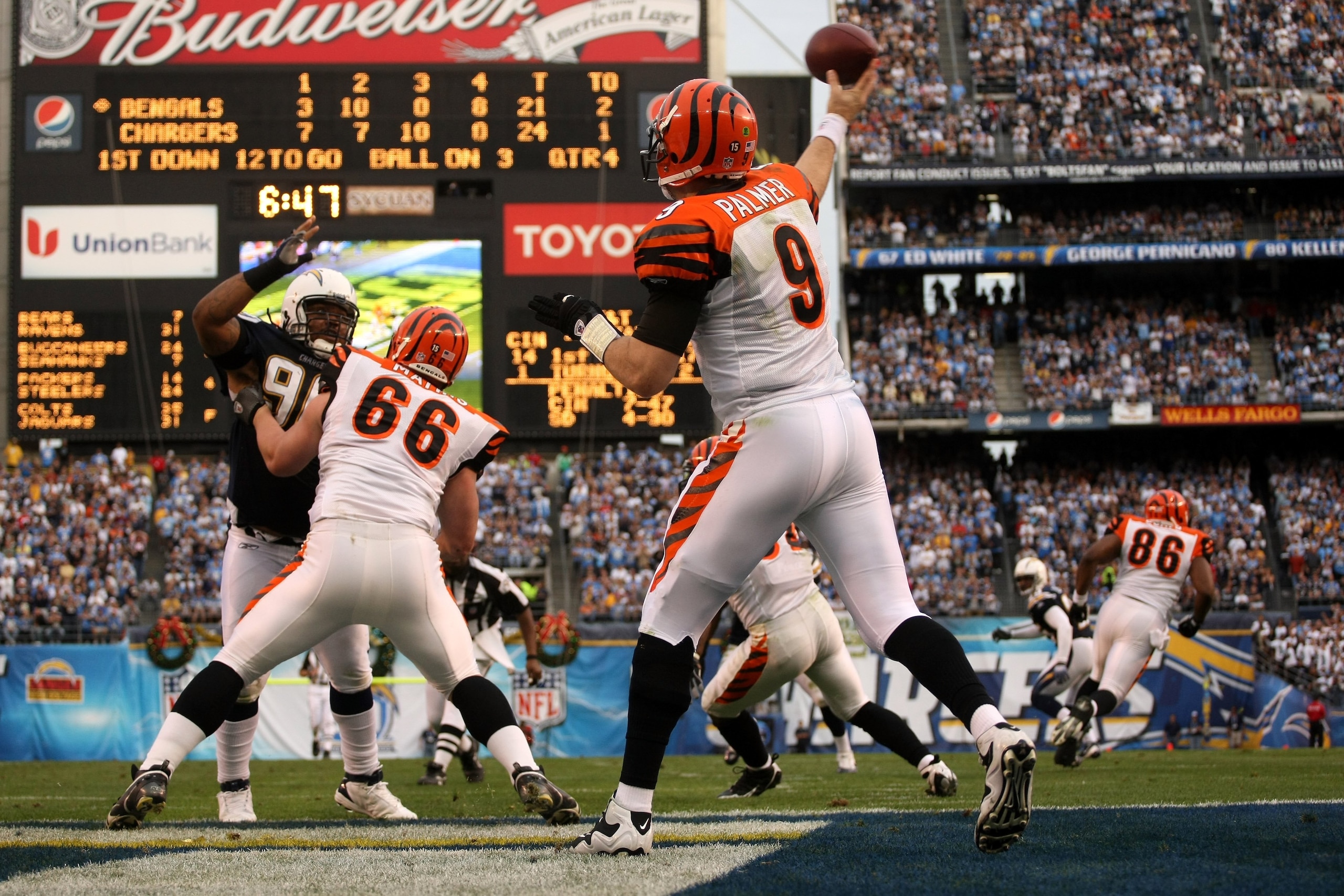 SAN DIEGO - DECEMBER 20:  Quarterback Carson Palmer #3 of the Cincinnati Bengals throws from the end zone against the San Diego Chargers on December 20, 2009 at Qualcomm Stadium in San Diego, California.  The Chargers won 27-24.  (Photo by Stephen Dunn/Ge