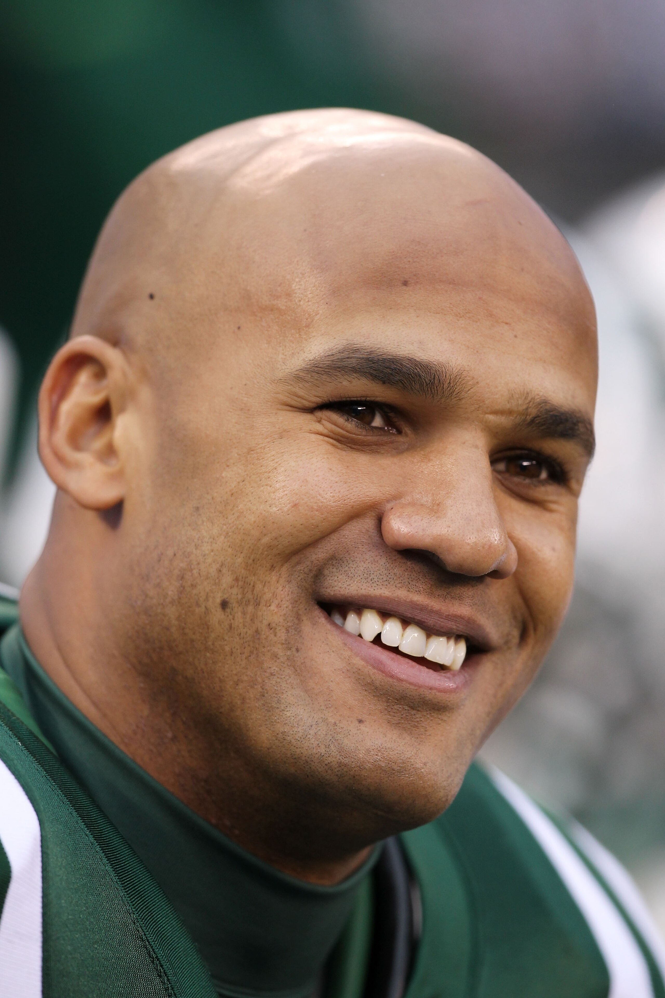 EAST RUTHERFORD, NJ - JANUARY 02:  Jason Taylor #99 of the New York Jets looks on from the sidelines against the Buffalo Bills at New Meadowlands Stadium on January 2, 2011 in East Rutherford, New Jersey.  (Photo by Al Bello/Getty Images)