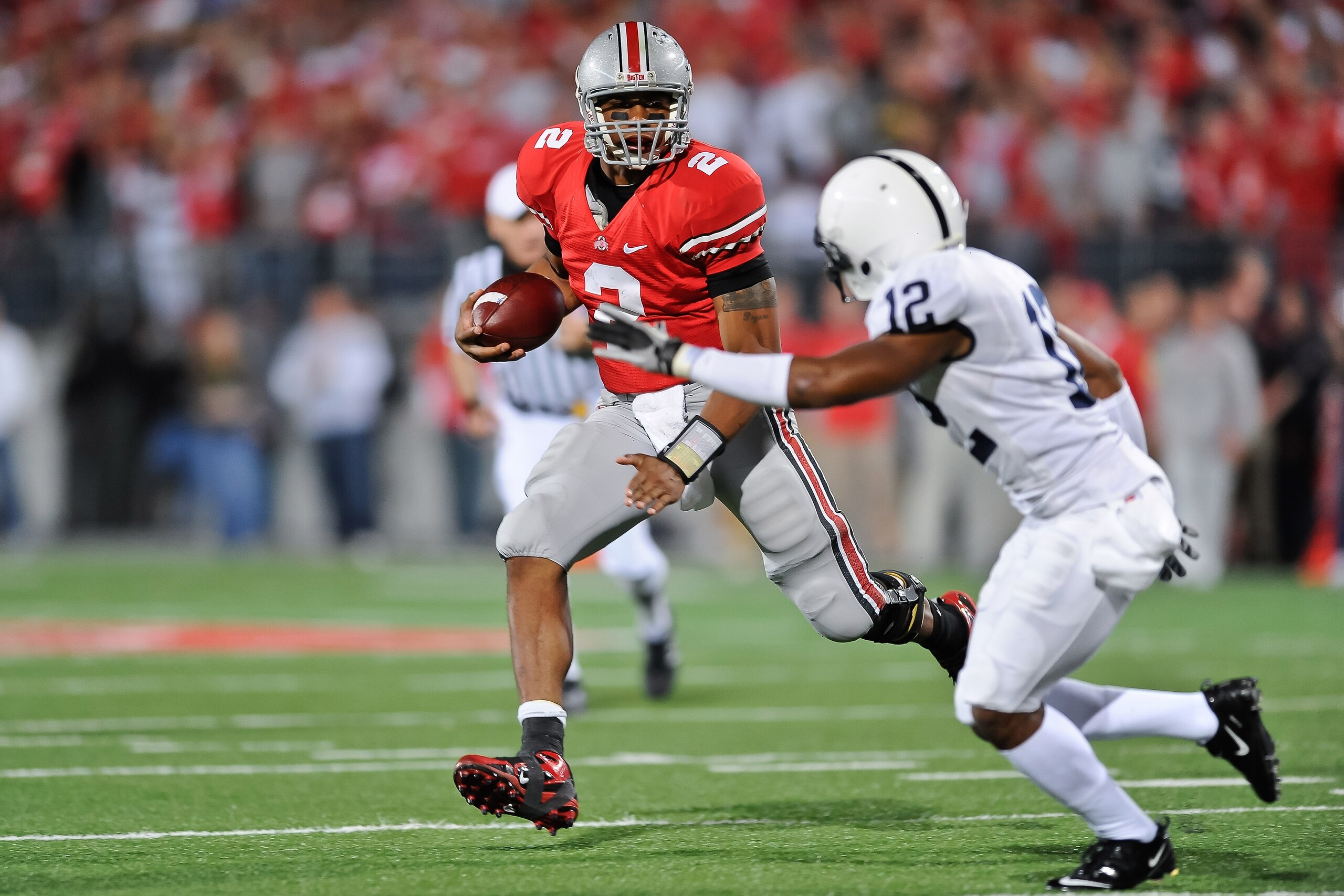 COLUMBUS, OH - NOVEMBER 13:  Quarterback Terrelle Pryor #2 of the Ohio State Buckeyes runs with the ball against the Penn State Nittany Lions at Ohio Stadium on November 13, 2010 in Columbus, Ohio.  (Photo by Jamie Sabau/Getty Images)