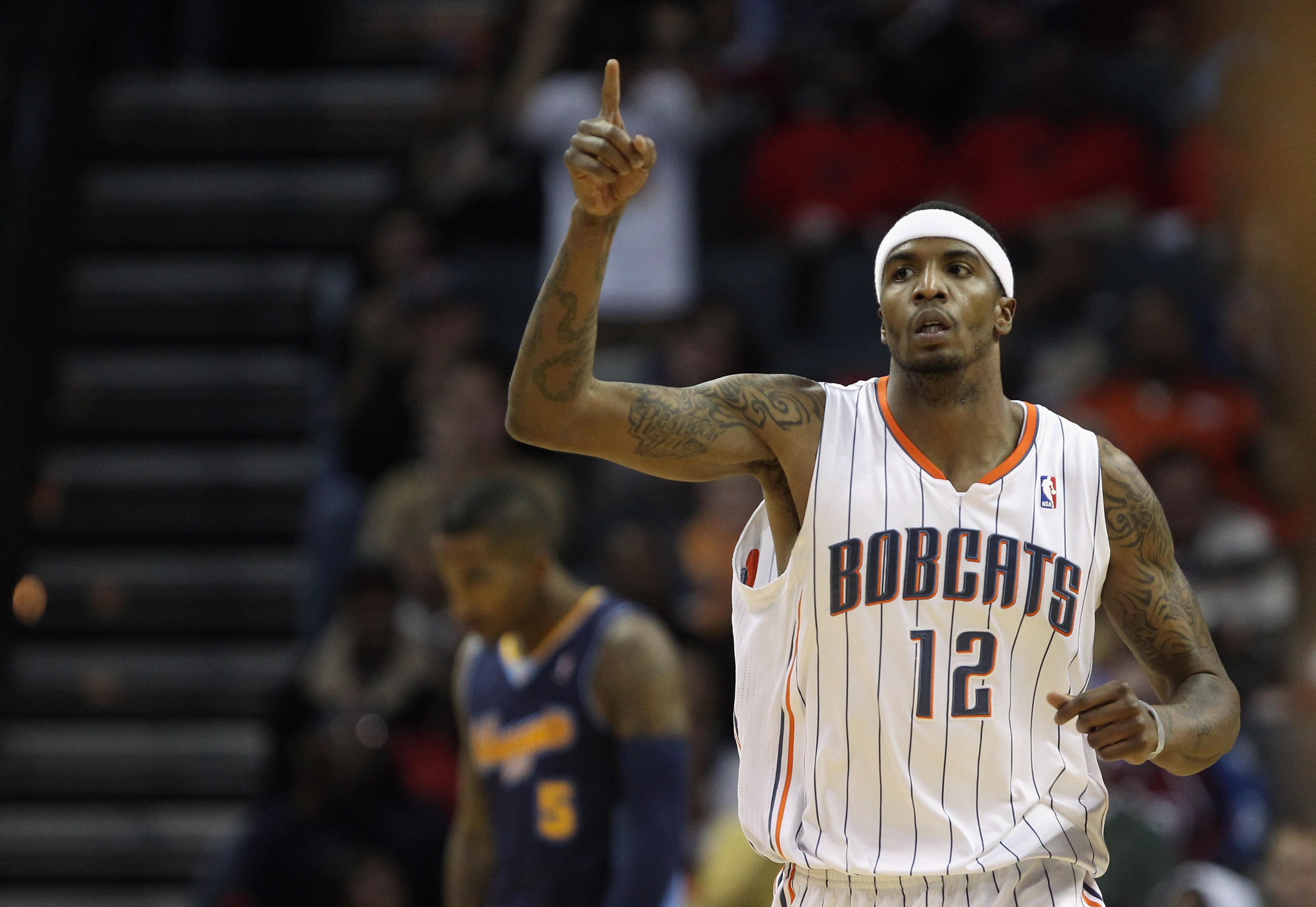 CHARLOTTE, NC - DECEMBER 07: Tyrus Thomas #12 of the Charlotte Bobcats reacts to scoring against the Denver Nuggets during their game at Time Warner Cable Arena on December 7, 2010 in Charlotte, North Carolina. NOTE TO USER: User expressly acknowledges CHARLOTTE, NC - DECEMBER 07: Tyrus Thomas #12 of the Charlotte Bobcats reacts to scoring against the Denver Nuggets during their game at Time Warner Cable Arena on December 7, 2010 in Charlotte, North Carolina. NOTE TO USER: User expressly acknowledges