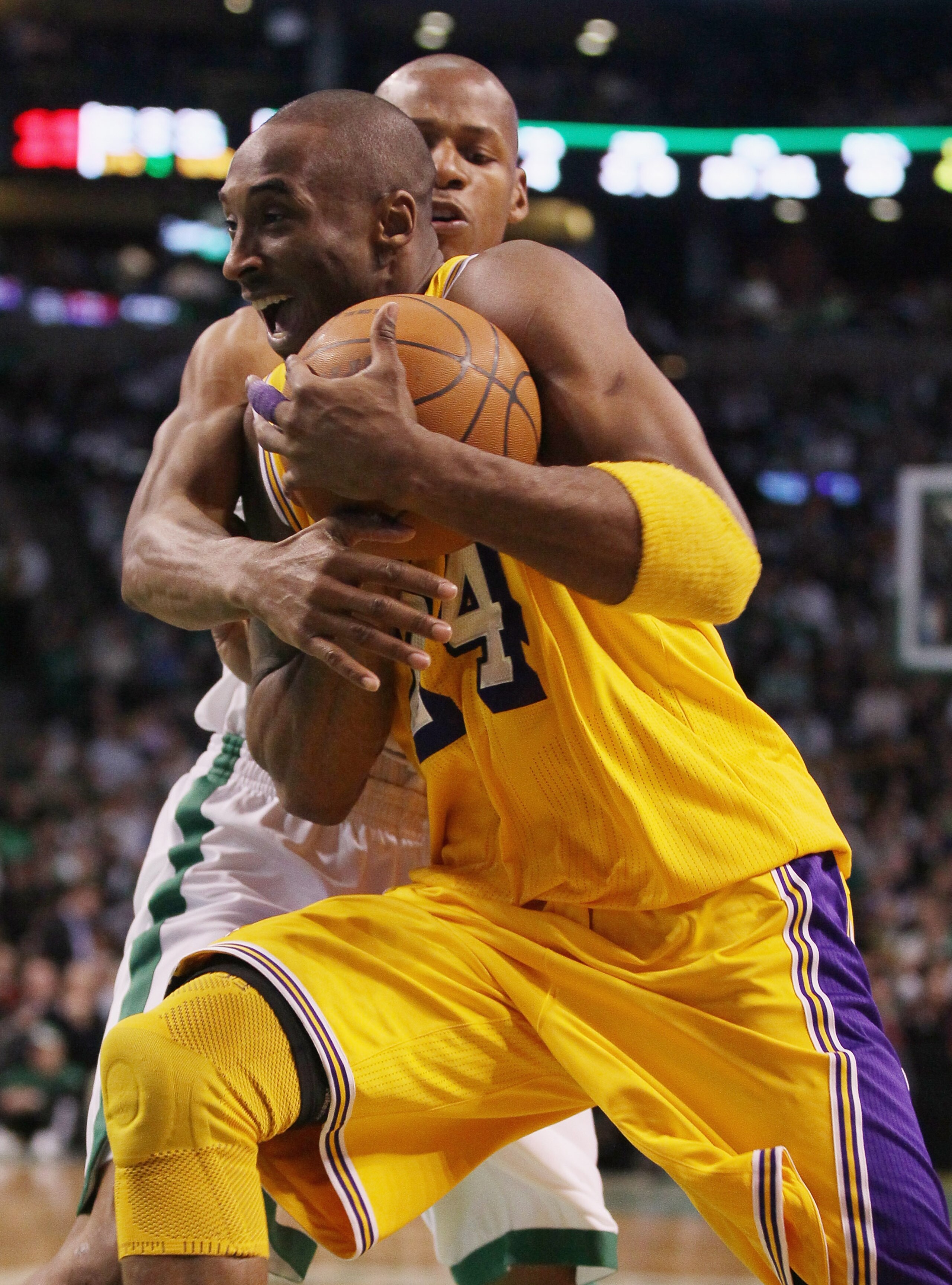 BOSTON, MA - FEBRUARY 10:  Kobe Bryant #24 of the Los Angeles Lakers tries to get around Ray Allen #20 of the Boston Celtics on February 10, 2011 at the TD Garden in Boston, Massachusetts.  The Lakers defeated the Celtics 92-86. NOTE TO USER: User express