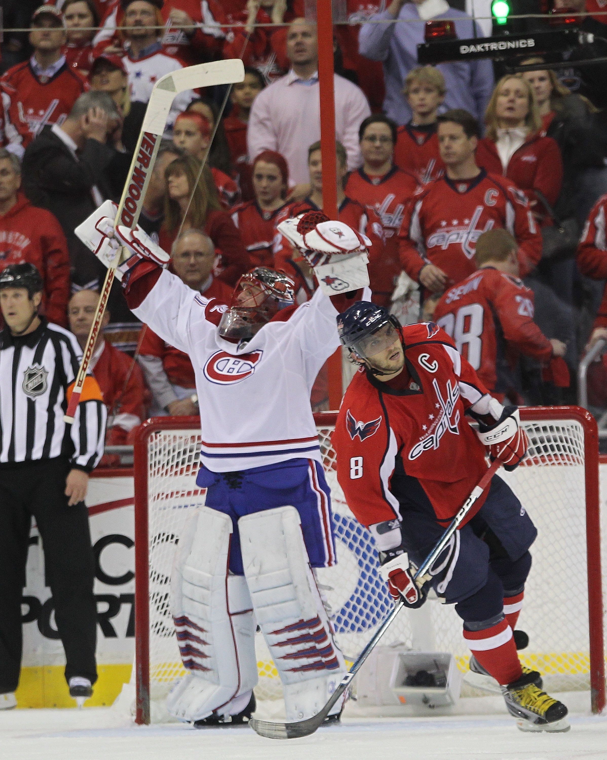 WASHINGTON - APRIL 28: Jaroslav Halak #41 of the Montreal Canadiens celebrates as Alex Ovechkin #8 of the Washington Capitals skates away following the Canadiens 2-1 win in Game Seven of the Eastern Conference Quarterfinals during the 2010 NHL Stanley Cup