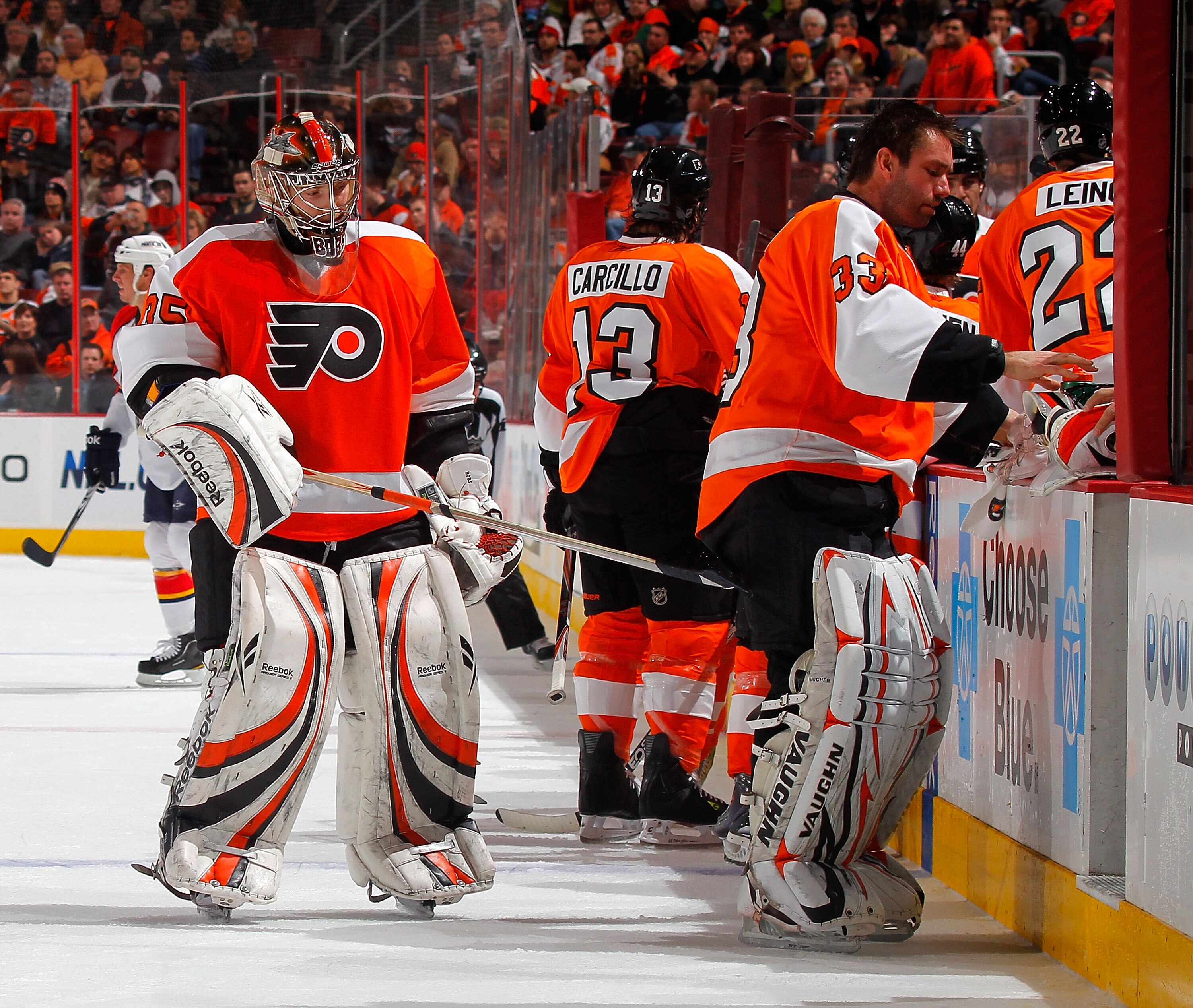 PHILADELPHIA, PA - DECEMBER 20:  Goalie Sergei Bobrovsky #35 of the Philadelphia Flyers gives his teammate Goalie Brian Boucher #33 a tap with his stick as Bobrovsky was just removed from the game after giving up four goals in a period and a half and Bouc