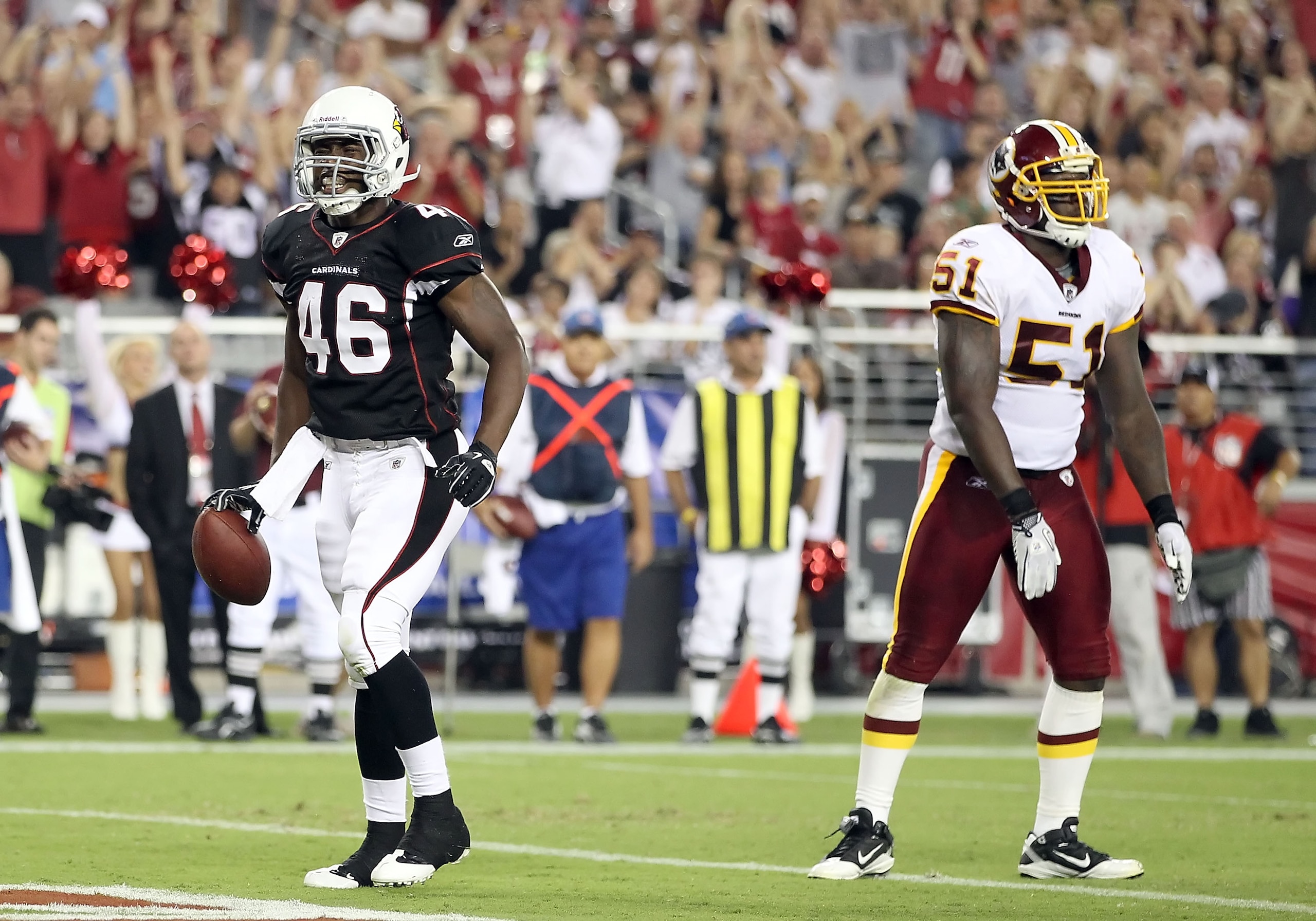 GLENDALE, AZ - SEPTEMBER 02:  Runningback Alfonso Smith #46 of the Arizona Cardinals scores a 3 yard rushing touchdown past Robert Henson #51 of the Washington Redskins during the second quarter of the preseason NFL game at the University of Phoenix Stadi