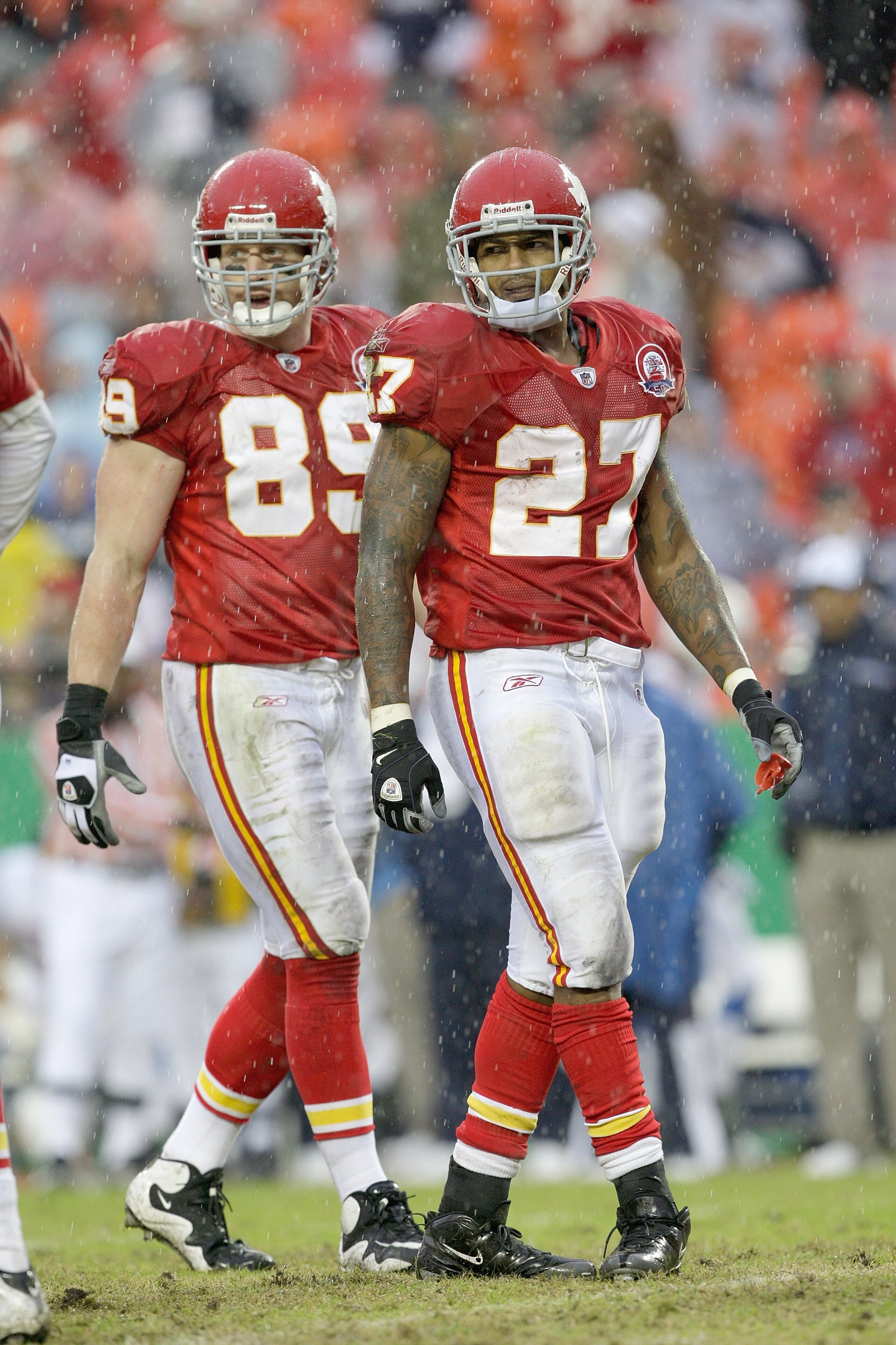 KANSAS CITY, MO - OCTOBER 25:  Larry Johnson #27 and Sean Ryan #89 of the Kansas City Chiefs look on the field during the game against the San Diego Chargers on October 25, 2009 at Arrowhead Stadium in Kansas City, Missouri. (Photo by Jamie Squire/Getty I
