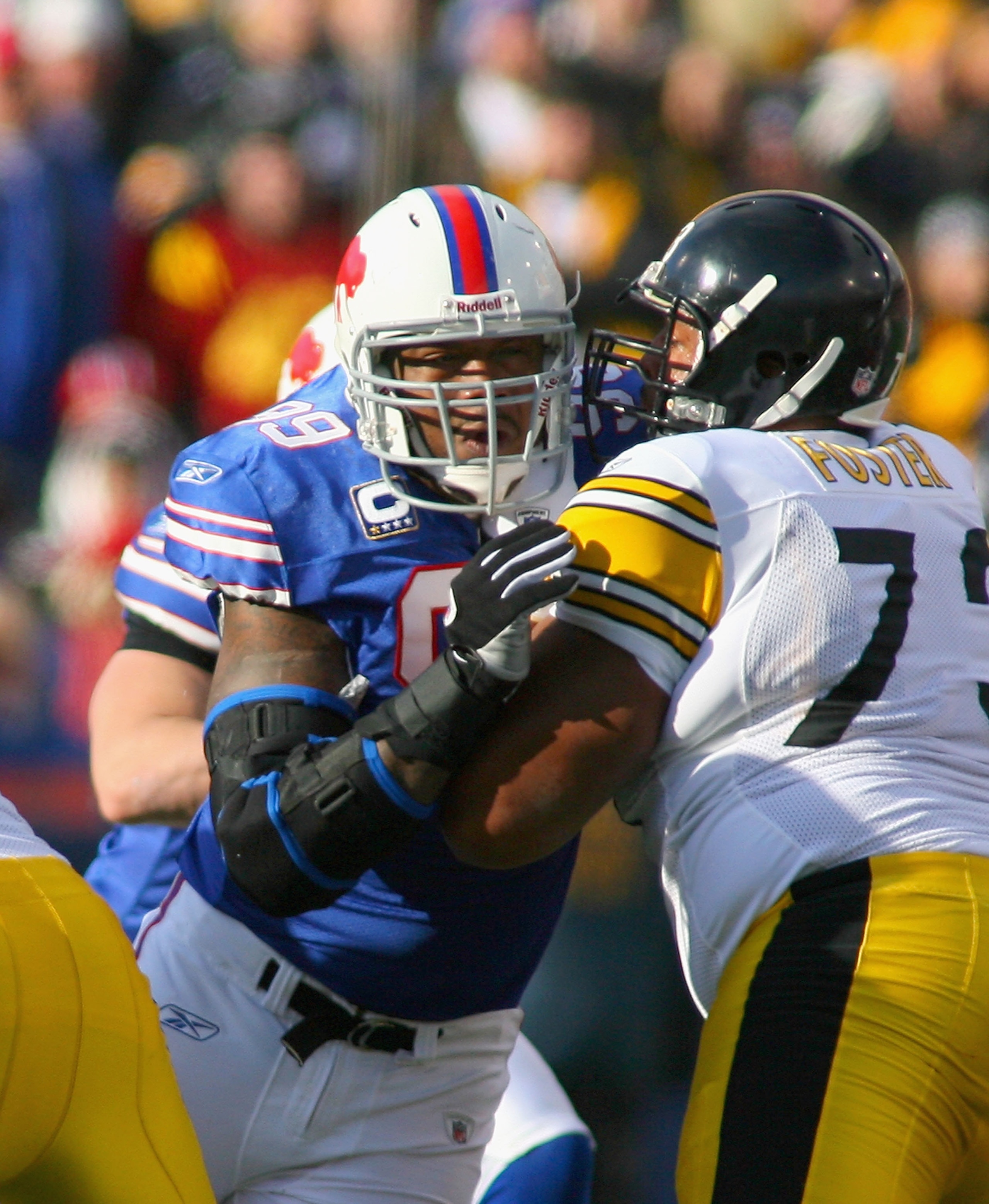 ORCHARD PARK, NY - NOVEMBER 28: Marcus Stroud #99 of the Buffalo Bills plays against Ramon Foster #73 of the Pittsburgh Steelers at Ralph Wilson Stadium on November 28, 2010 in Orchard Park, New York. Pittsburgh won 19-16 in overtime.  (Photo by Rick Stew