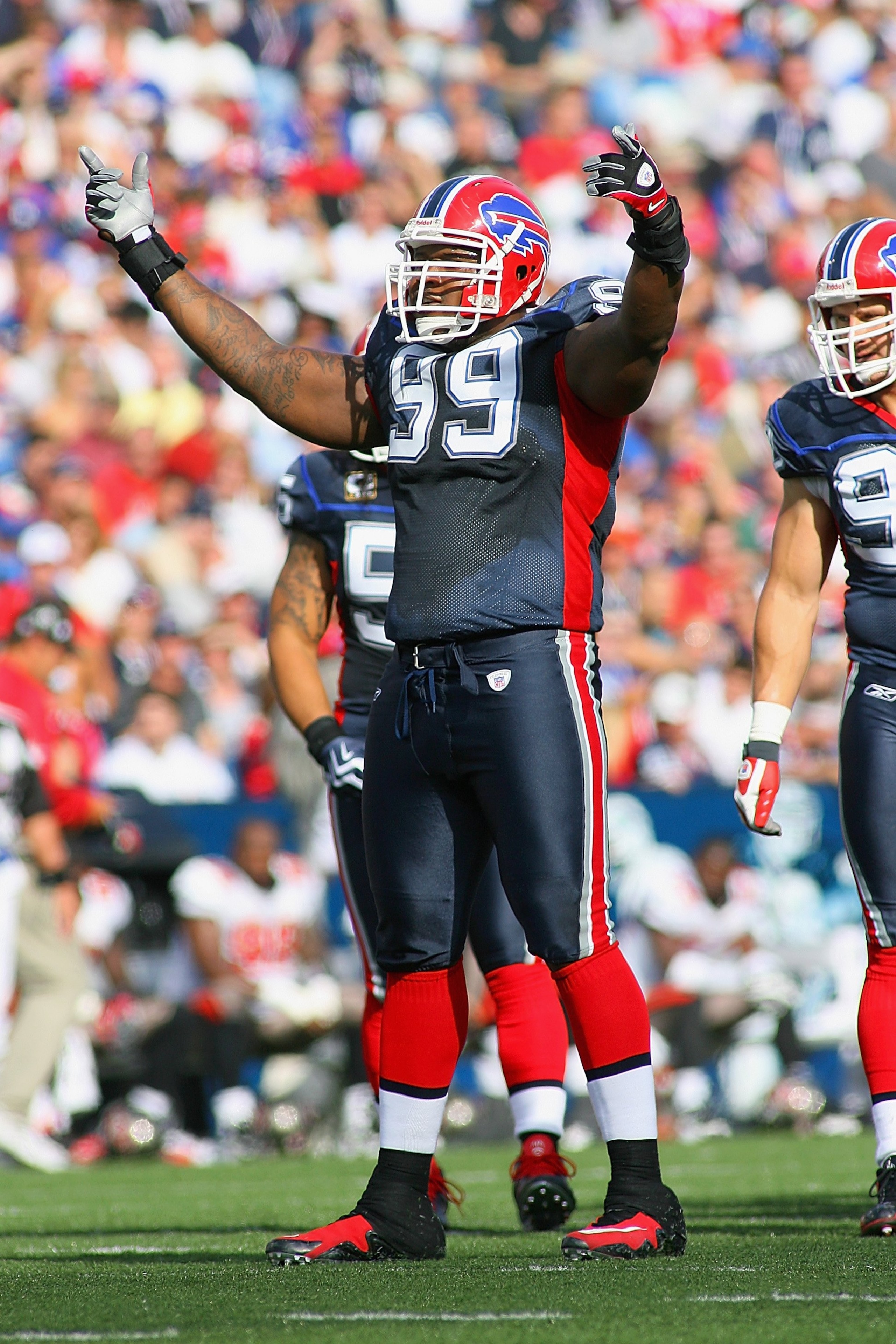 ORCHARD PARK, NY - SEPTEMBER 20:  Defensive tackle Marcus Stroud #99 of the Buffalo Bills celebrates during the game against the Tampa Bay Buccaneers at Ralph Wilson Stadium on September 20, 2009 in Orchard Park, New York.  The Bills won 33-20.  (Photo by