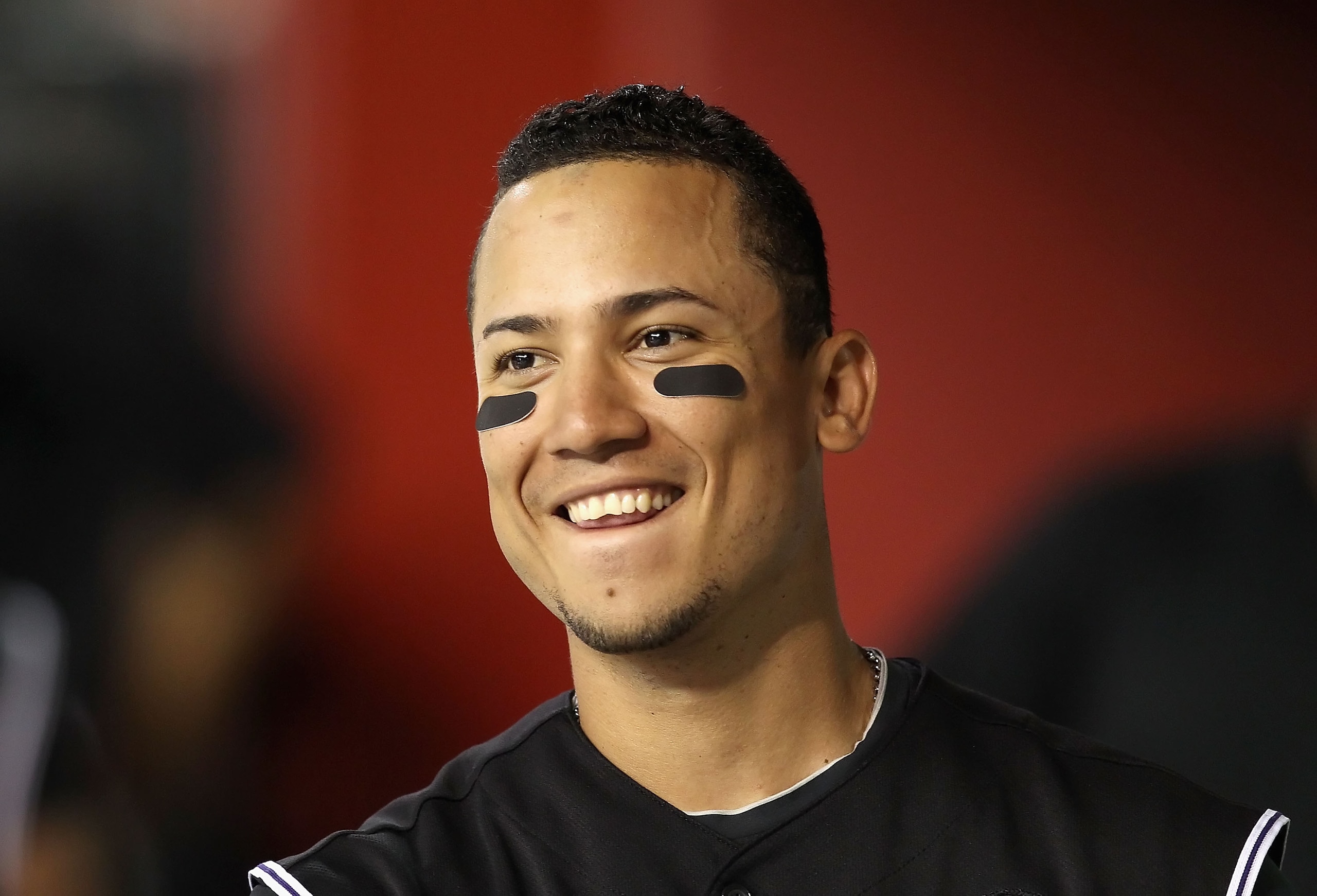 PHOENIX - SEPTEMBER 21:  Carlos Gonzalez #5 of the Colorado Rockies during the Major League Baseball game against the Arizona Diamondbacks at Chase Field on September 21, 2010 in Phoenix, Arizona.  (Photo by Christian Petersen/Getty Images)