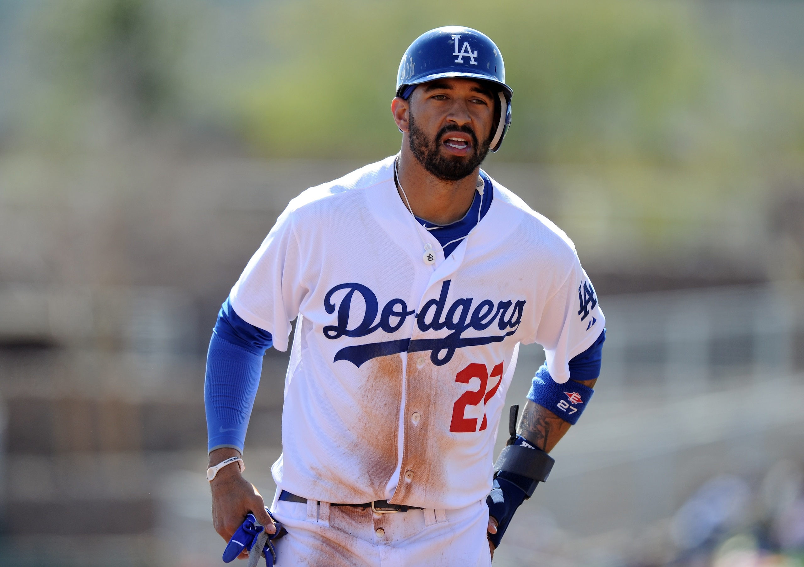 PHOENIX, AZ - FEBRUARY 27:  Matt Kemp #27 of the Los Angeles Dodgers leaves the field during spring training at Camelback Ranch on February 27, 2011 in Phoenix, Arizona.  (Photo by Harry How/Getty Images)