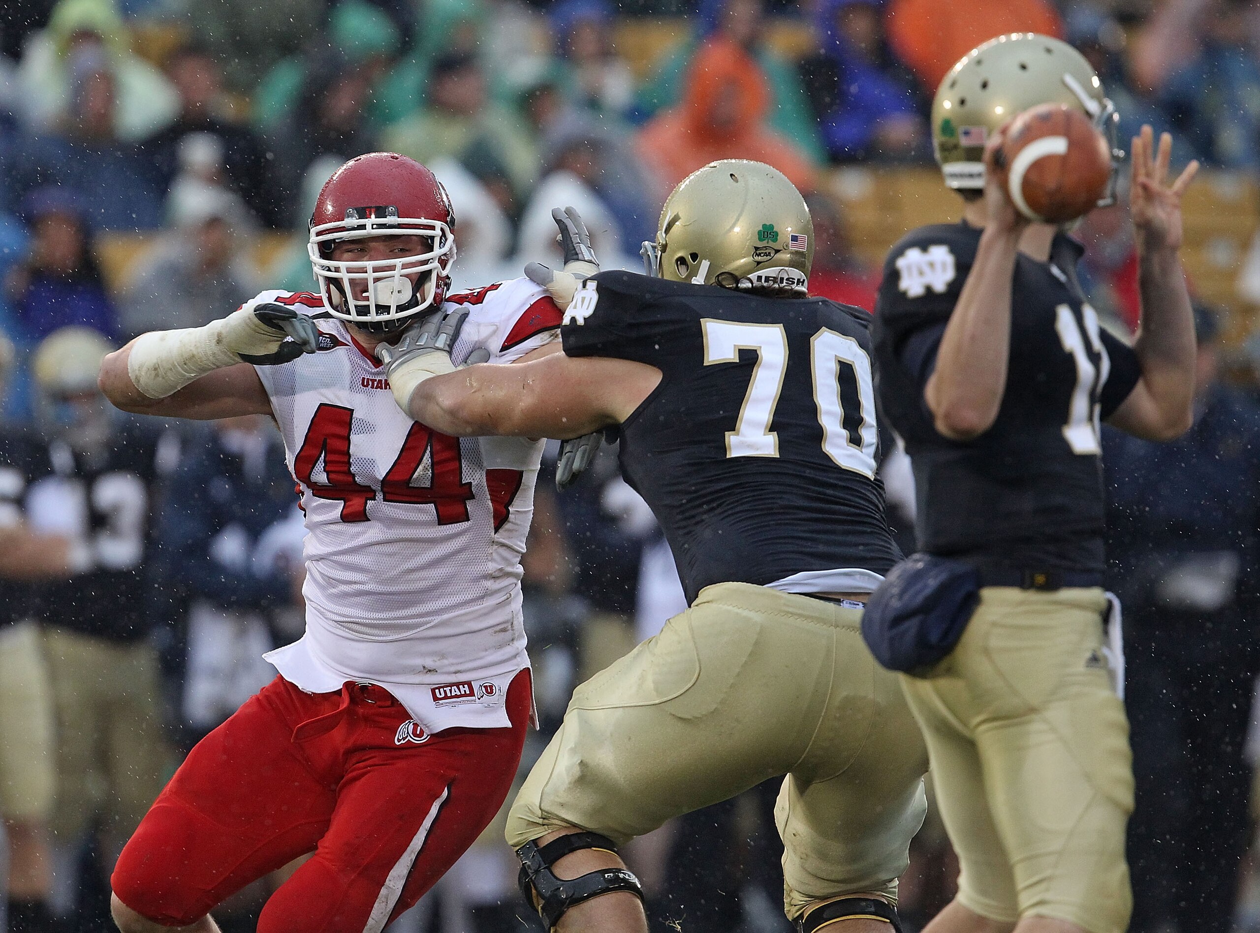 SOUTH BEND, IN - NOVEMBER 13: Dave Kruger #44 of the Utah Utes rushes against Zack Martin #70 of the Notre Dame Fighting Irish as Tommy Rees #13 passes the ball at Notre Dame Stadium on November 13, 2010 in South Bend, Indiana. Notre Dame defeated Utah 28 SOUTH BEND, IN - NOVEMBER 13: Dave Kruger #44 of the Utah Utes rushes against Zack Martin #70 of the Notre Dame Fighting Irish as Tommy Rees #13 passes the ball at Notre Dame Stadium on November 13, 2010 in South Bend, Indiana. Notre Dame defeated Utah 28