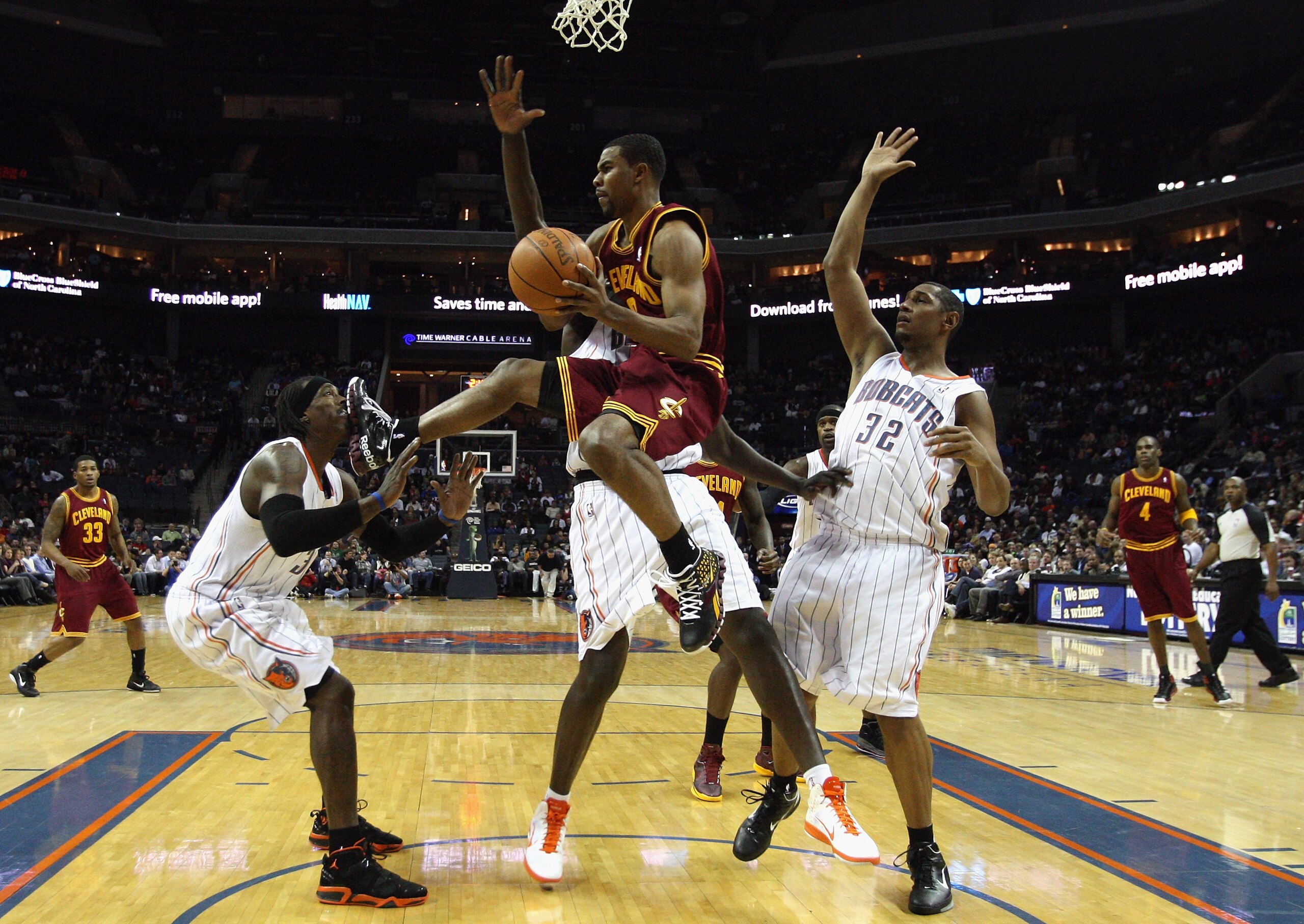 CHARLOTTE, NC - DECEMBER 29:  Ramon Sessions #3 of the Cleveland Cavaliers looks to pass as he kicks Gerald Wallce #3 of the Charlotte Bobcats in the face during their game at Time Warner Cable Arena on December 29, 2010 in Charlotte, North Carolina. NOTE