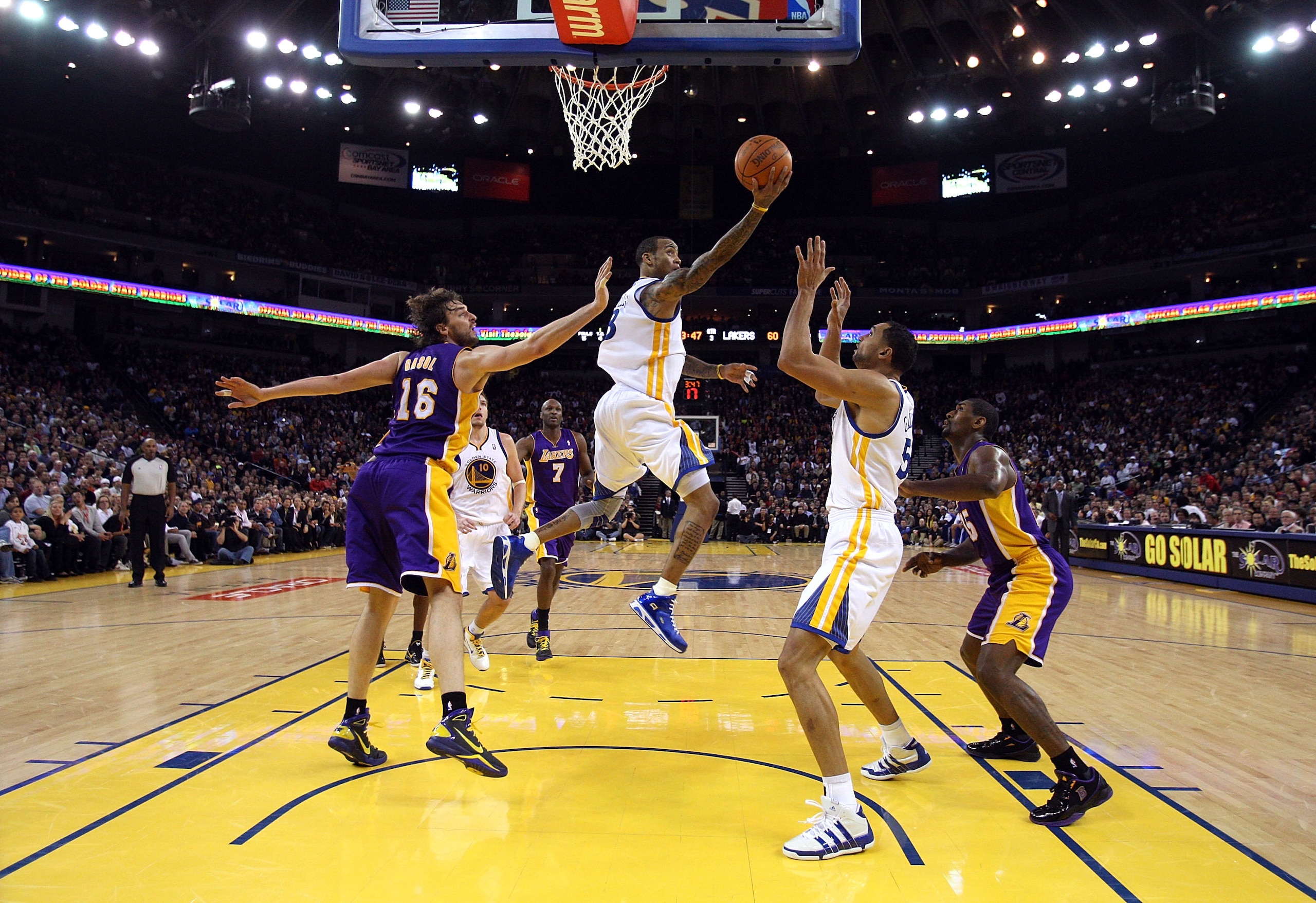 OAKLAND, CA - JANUARY 12:  Monta Ellis #8 of the Golden State Warriors goes up for a shot against the Los Angeles Lakers at Oracle Arena on January 12, 2011 in Oakland, California. NOTE TO USER: User expressly acknowledges and agrees that, by downloading