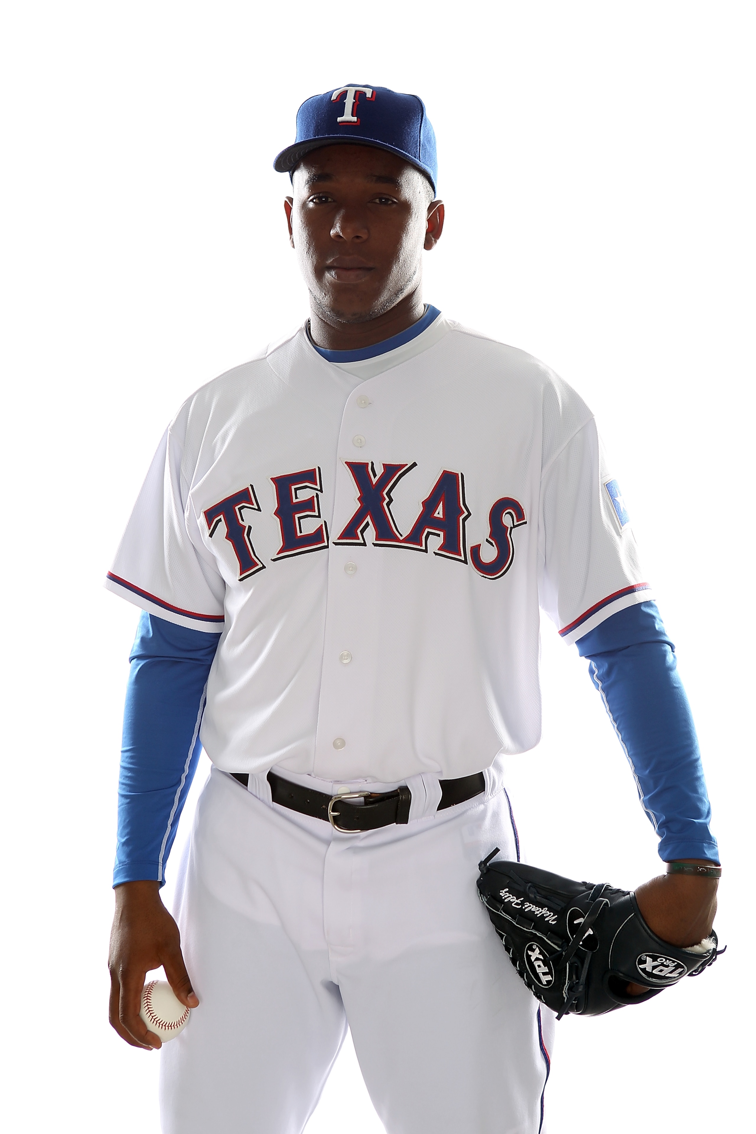 SURPRISE, AZ - FEBRUARY 25:  Neftali Feliz #30 of the Texas Rangers poses for a portrait during Spring Training Media Day on February 25, 2011 at Surprise Stadium in Surprise, Arizona.  (Photo by Jonathan Ferrey/Getty Images)