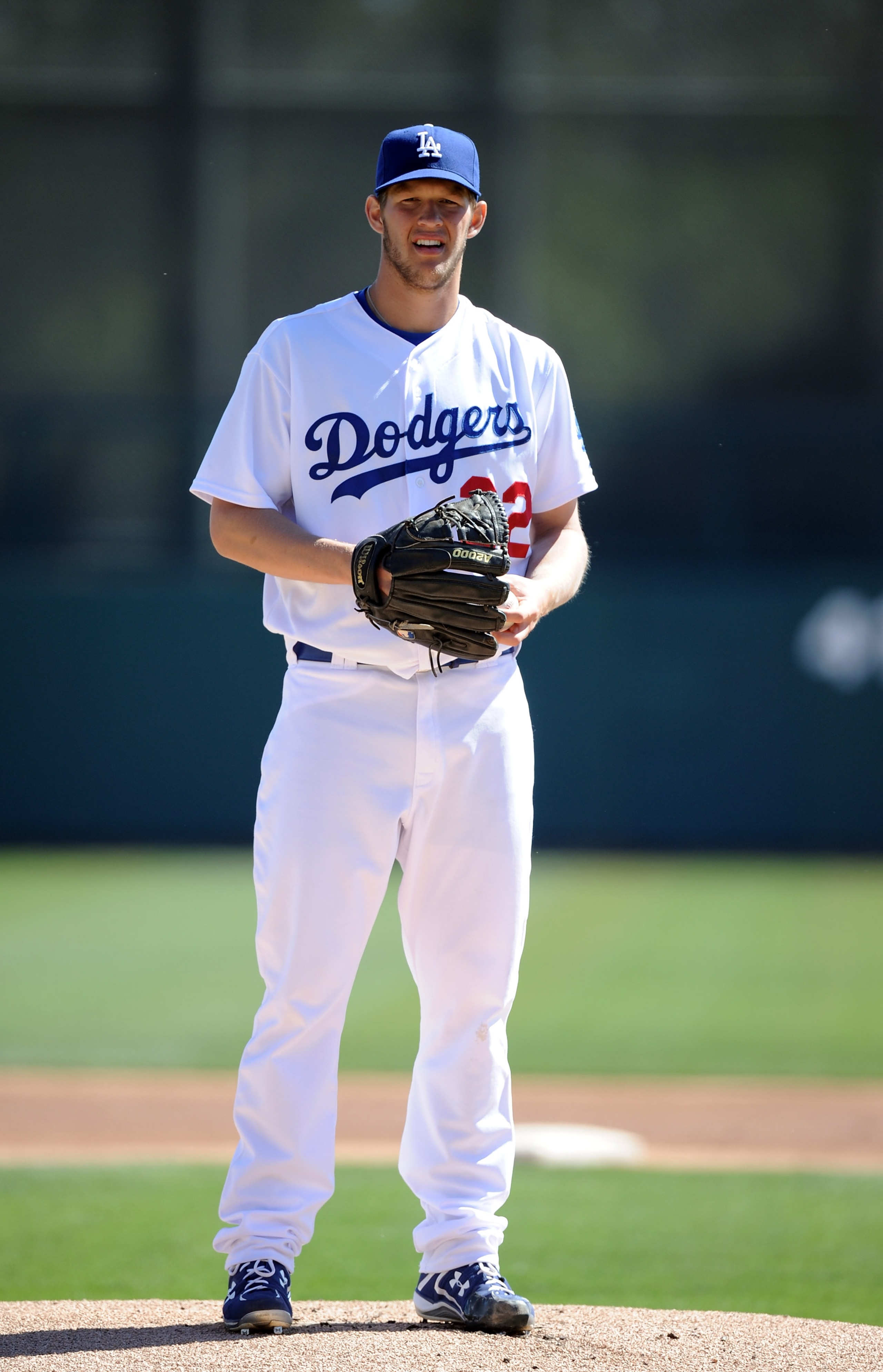 PHOENIX, AZ - FEBRUARY 28:  Clayton Kershaw #22 of the Los Angeles Dodgers pitches against the Chicago White Sox during spring training at Camelback Ranch on February 28, 2011 in Phoenix, Arizona.  (Photo by Harry How/Getty Images)