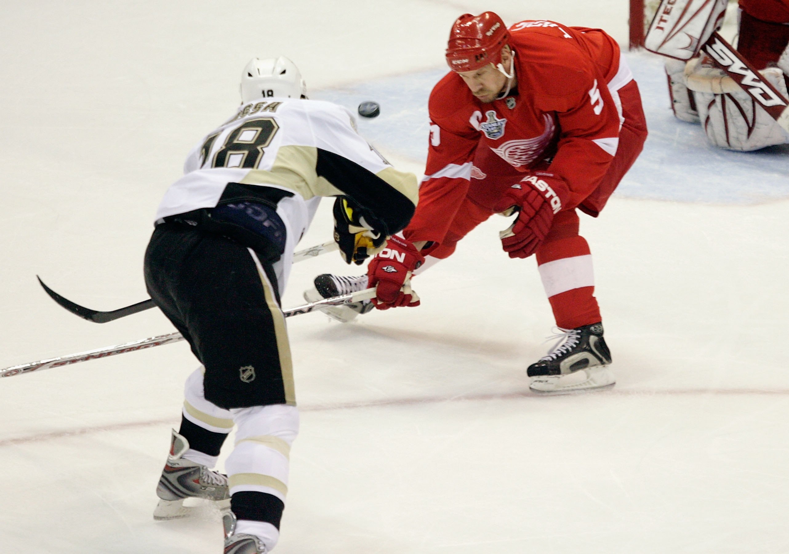 DETROIT - JUNE 02:  Marian Hossa #18 of the Pittsburgh Penguins fires the puck past Nicklas Lidstrom #5 of the Detroit Red Wings for a goal during game five of the 2008 NHL Stanley Cup Finals at Joe Louis Arena on June 2, 2008 in Detroit, Michigan. The Pe