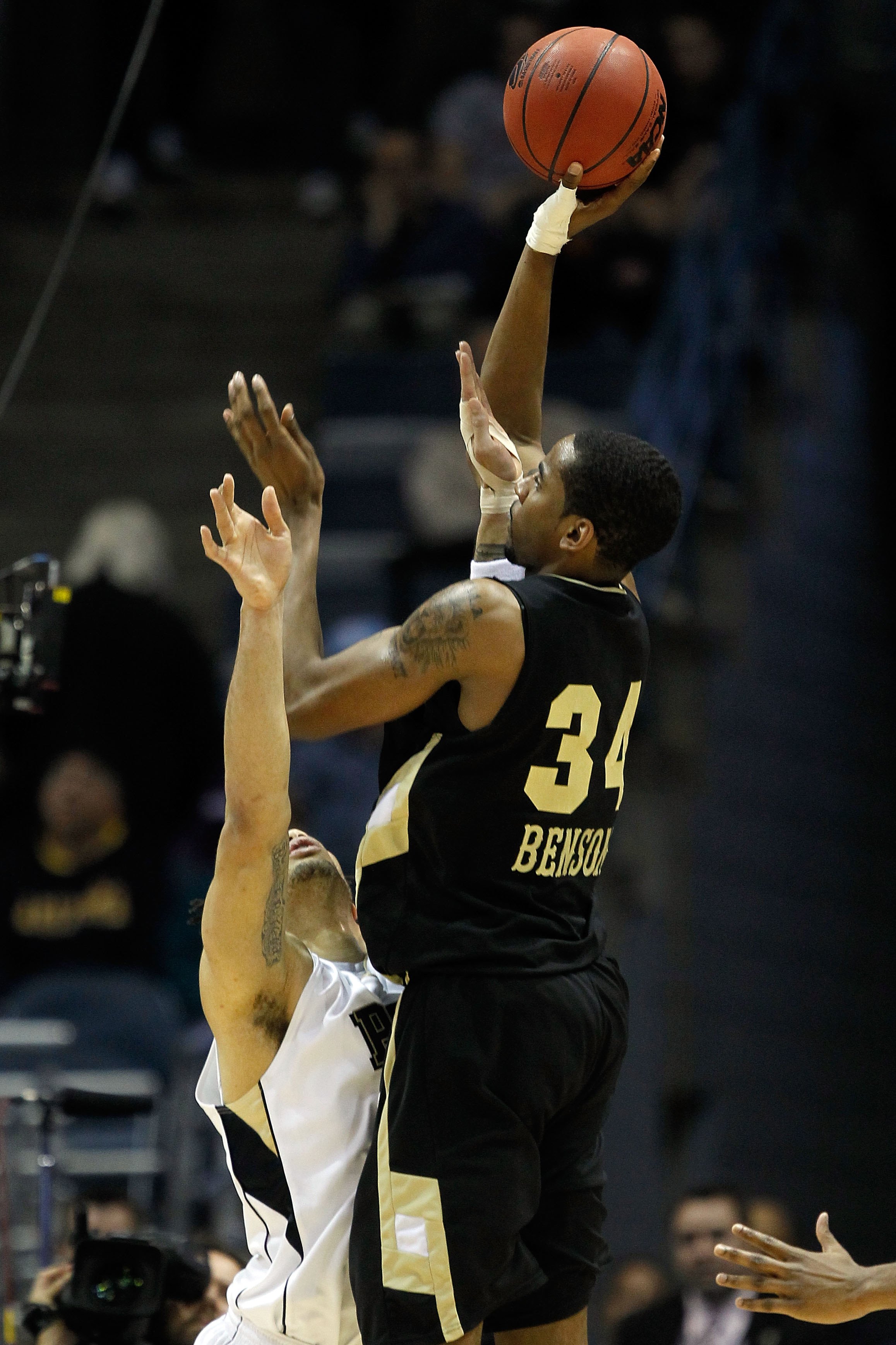 MILWAUKEE - MARCH 19: Keith Benson #34 of the Oakland Golden Grizzlies shoots the ball over Gary McGhee #52 of the Pittsburgh Panthers in the second half during the first round of the 2010 NCAA men's basketball tournament at the Bradley Center on March 1