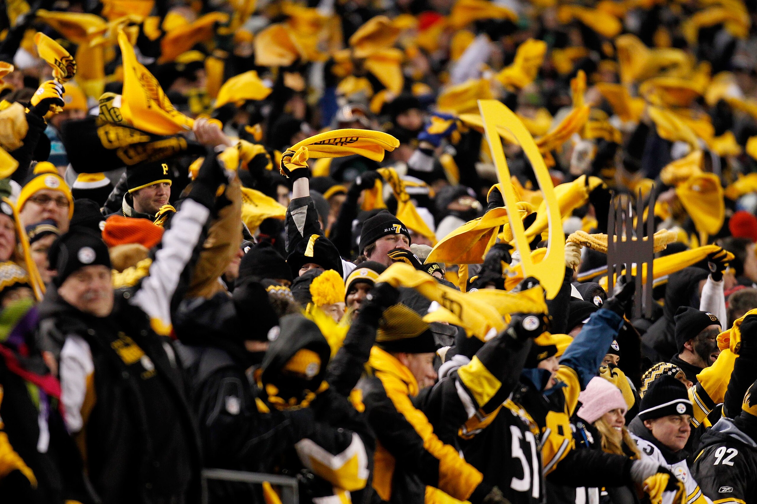 PITTSBURGH, PA - JANUARY 23:  Pittsburgh Steelers fans celebrate during their 24 to 19 win over the New York Jets during the 2011 AFC Championship game at Heinz Field on January 23, 2011 in Pittsburgh, Pennsylvania.  (Photo by Gregory Shamus/Getty Images)