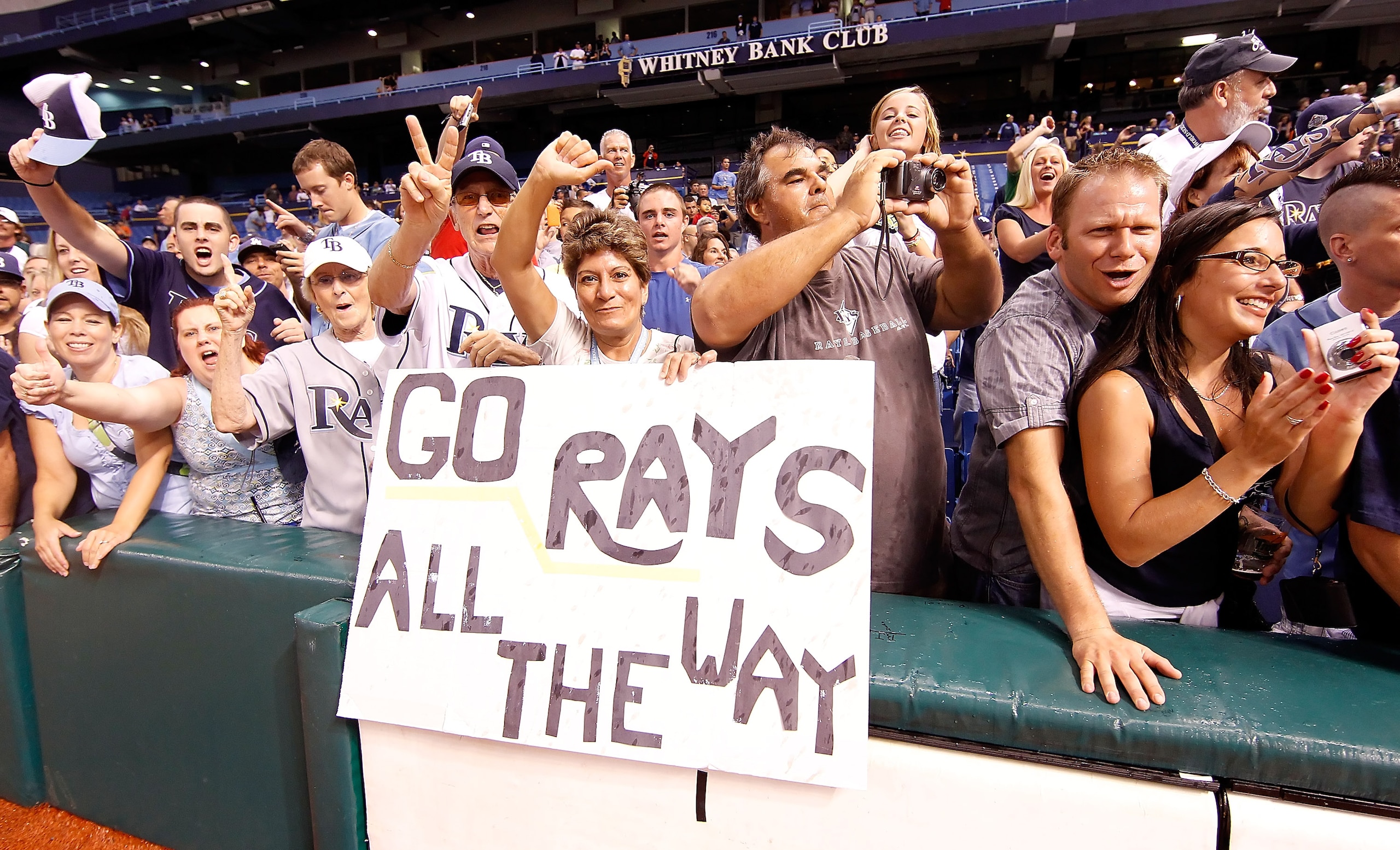 ST. PETERSBURG, FL - SEPTEMBER 28:  Fans of the Tampa Bay Rays celebrate after the Rays clinch a playoff birth against the Baltimore Orioles at Tropicana Field on September 28, 2010 in St. Petersburg, Florida.  (Photo by J. Meric/Getty Images)