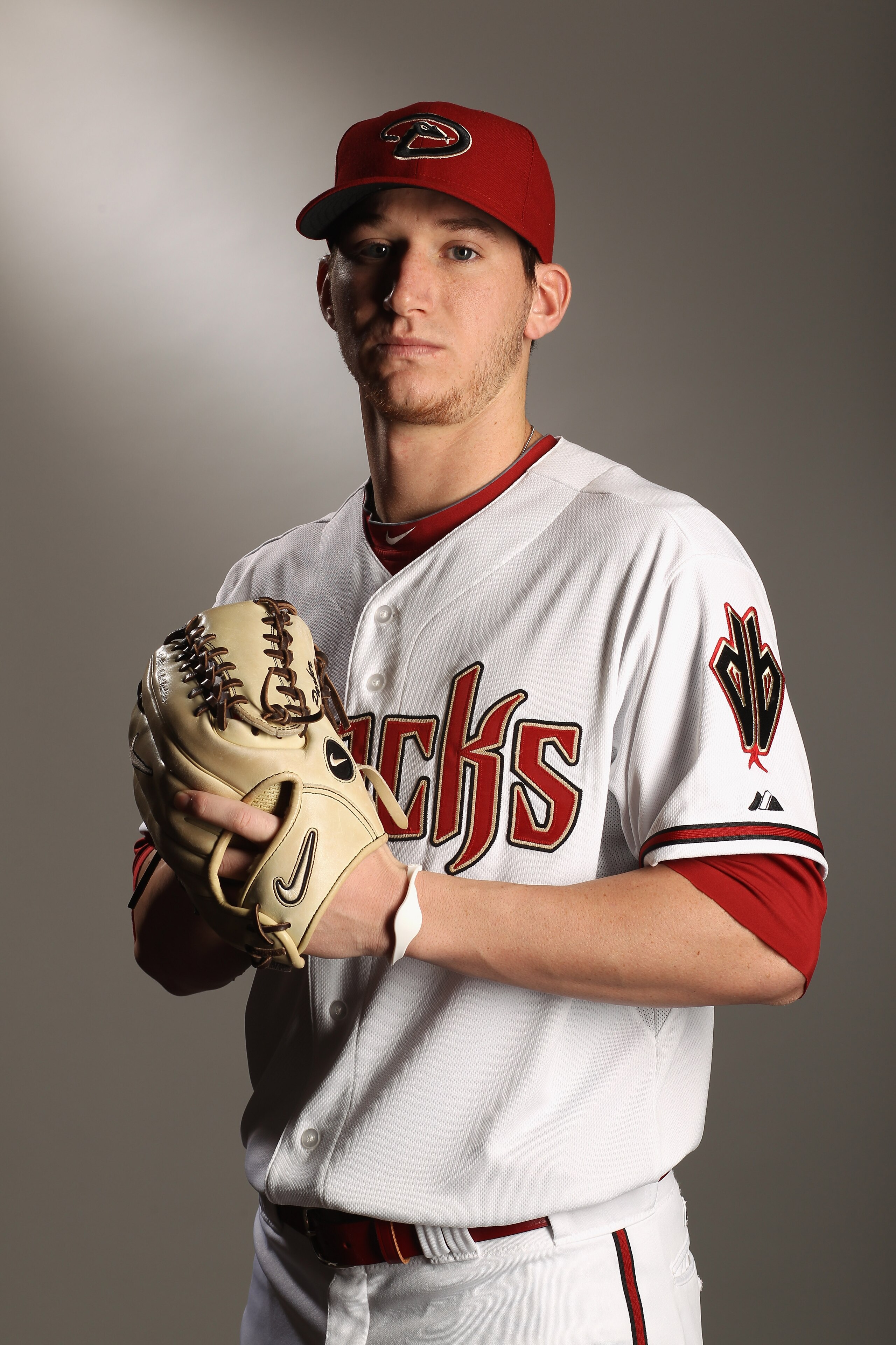 SCOTTSDALE, AZ - FEBRUARY 21:  Jarrod Parker #61 of the Arizona Diamondbacks poses for a portrait at Salt River Fields at Talking Stick on February 21, 2011 in Scottsdale, Arizona.  (Photo by Ezra Shaw/Getty Images)