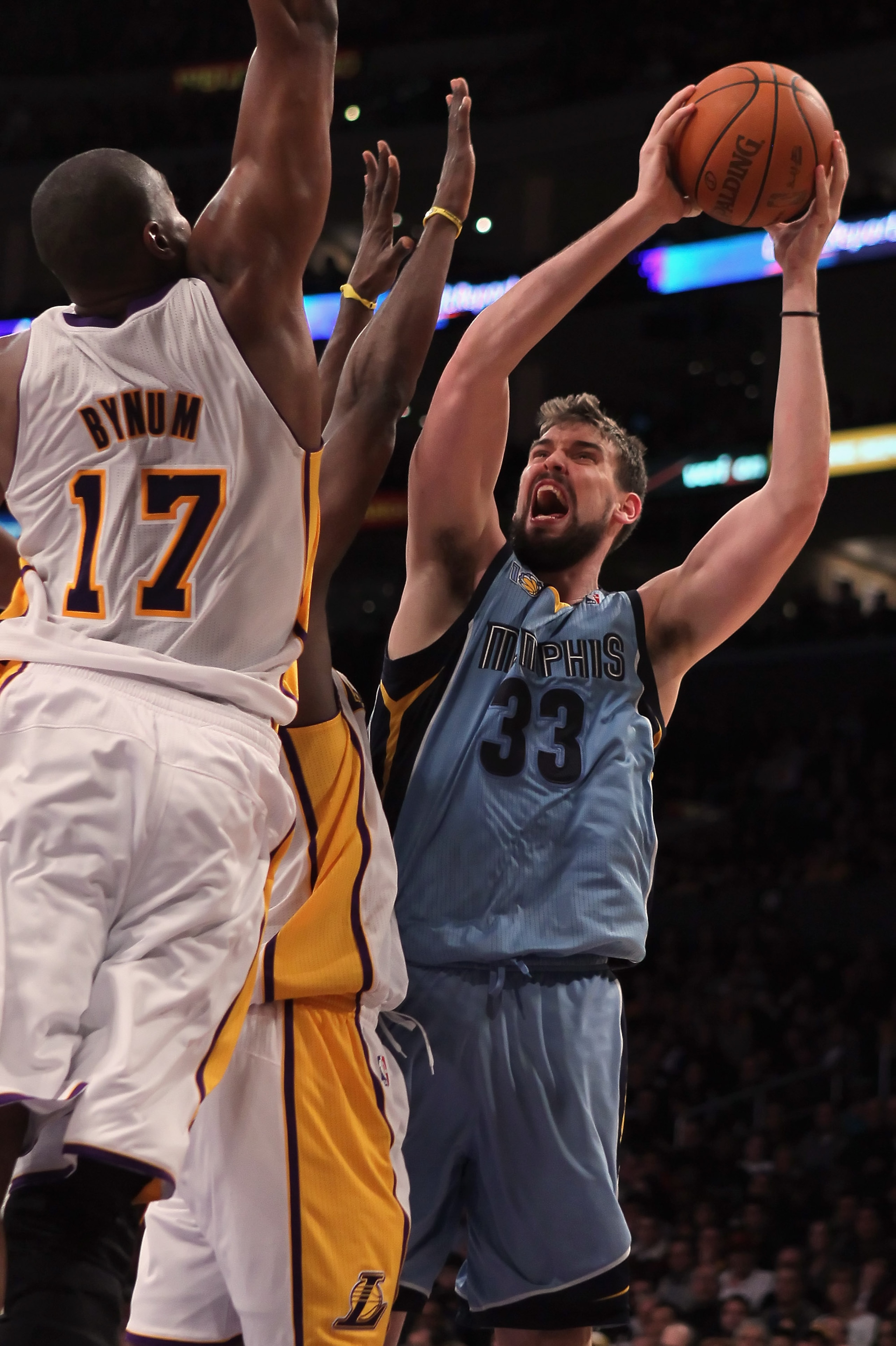 LOS ANGELES, CA - JANUARY 02:  Marc Gasol #33 of the Memphis Grizzlies drives to the basket while being defended by Andrew Bynum #17 of the Los Angeles Lakers during the first half at Staples Center on January 2, 2011 in Los Angeles, California. The Grizz