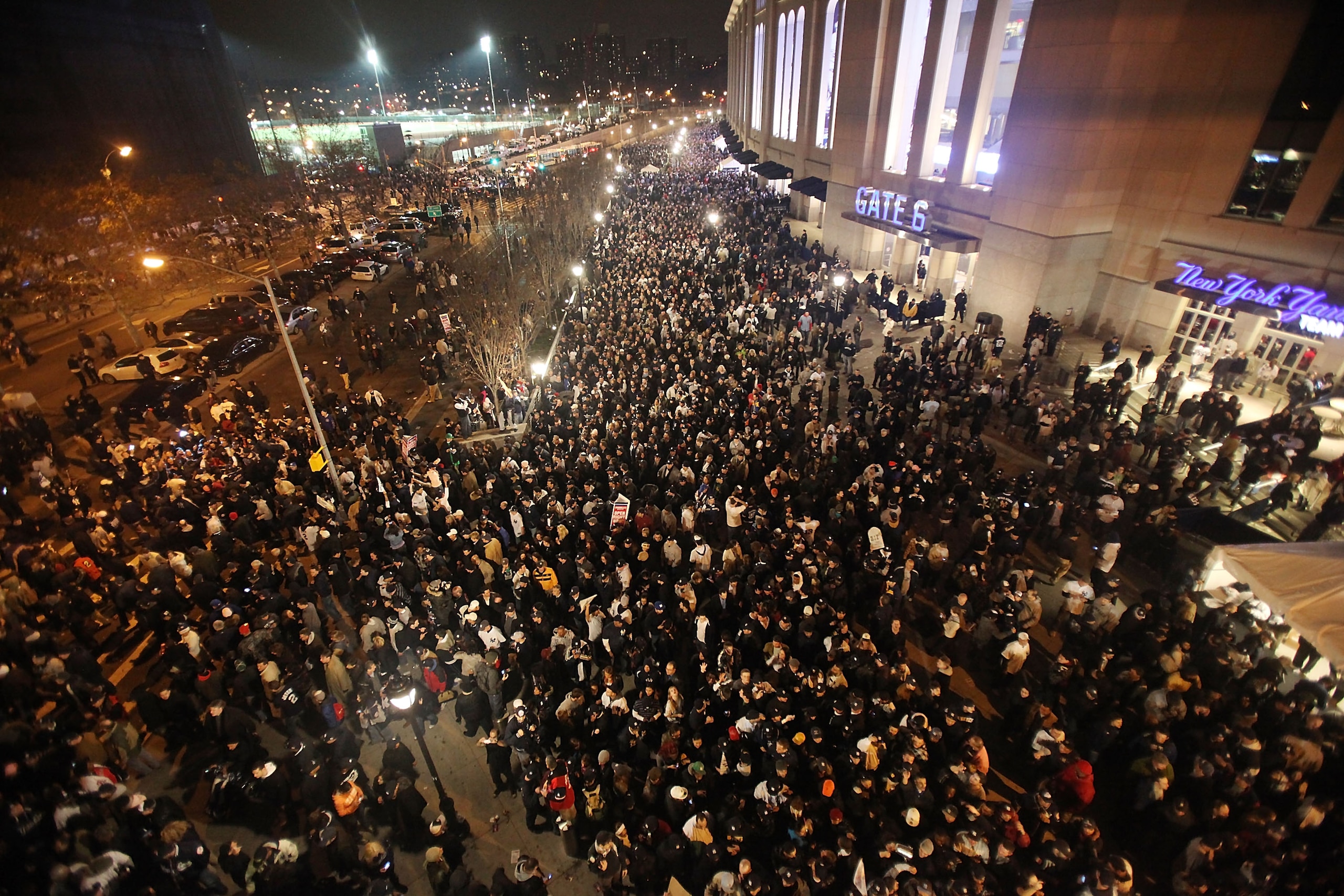 NEW YORK - NOVEMBER 04:  Yankees fans celebrate outside Yankee Stadium following the New York Yankees game against the Philadelphia Phillies in Game Six of the 2009 MLB World Series on November 4, 2009 in the Bronx borough of New York City.The Yankees def