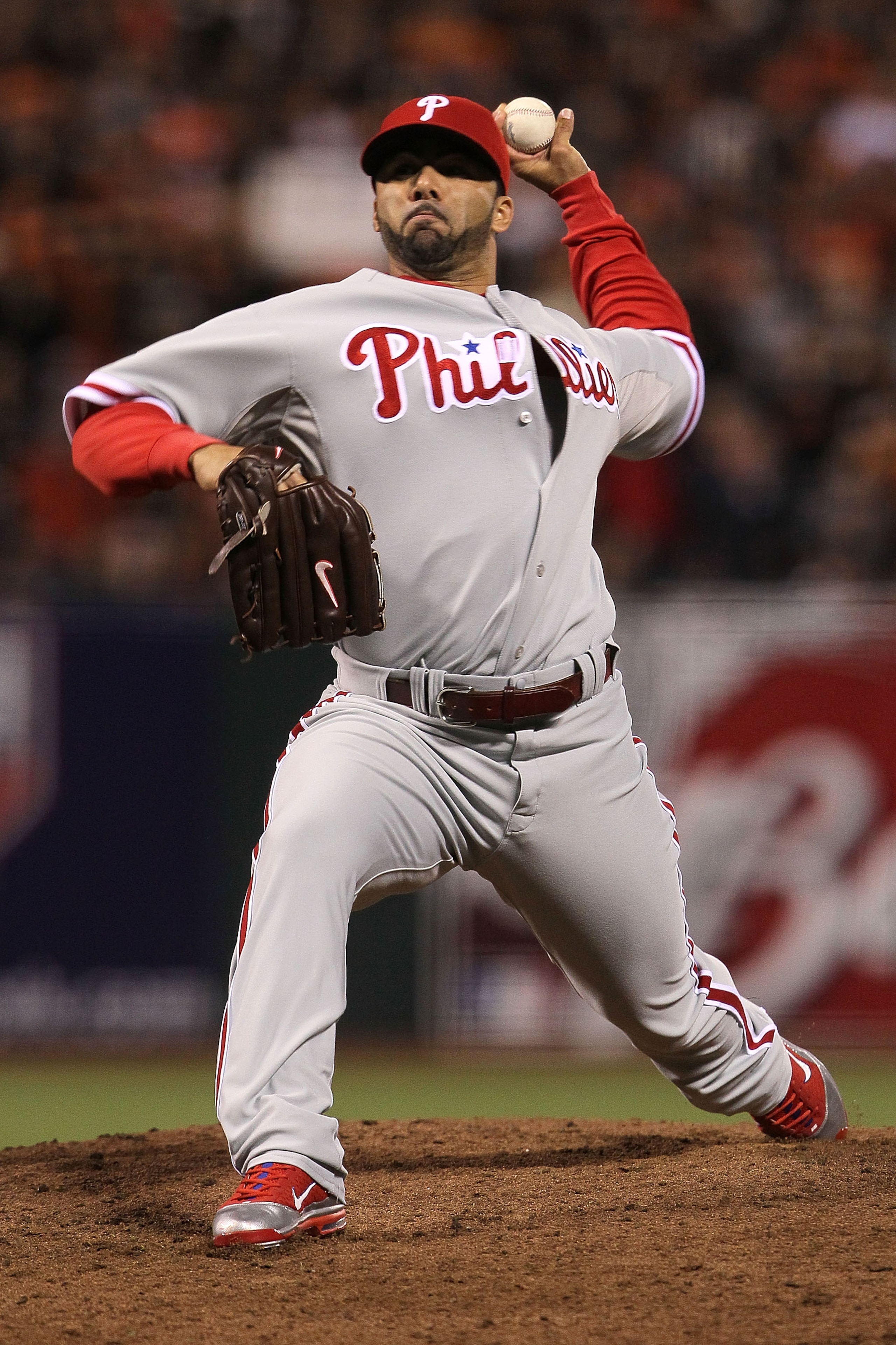 SAN FRANCISCO - OCTOBER 21: J.C. Romero #16 of the Philadelphia Phillies throws a pitch against the San Francisco Giants in Game Five of the NLCS during the 2010 MLB Playoffs at AT&T Park on October 21, 2010 in San Francisco, California. (Photo by Justi SAN FRANCISCO - OCTOBER 21: J.C. Romero #16 of the Philadelphia Phillies throws a pitch against the San Francisco Giants in Game Five of the NLCS during the 2010 MLB Playoffs at AT&T Park on October 21, 2010 in San Francisco, California. (Photo by Justi