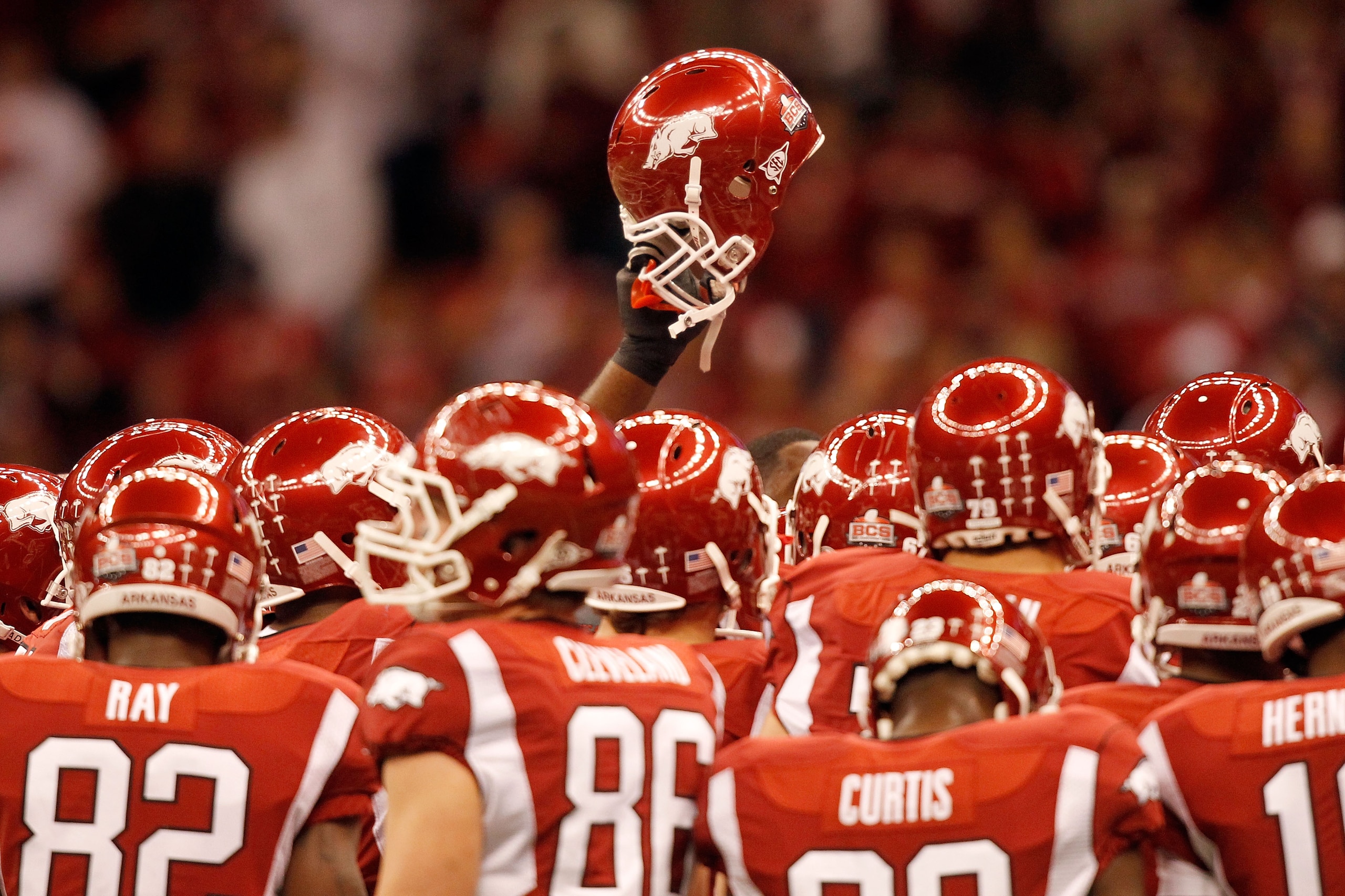 NEW ORLEANS, LA - JANUARY 04:  The Arkansas Razorbacks huddle before taking on the Ohio State Buckeyes during the Allstate Sugar Bowl at the Louisiana Superdome on January 4, 2011 in New Orleans, Louisiana.  (Photo by Matthew Stockman/Getty Images)