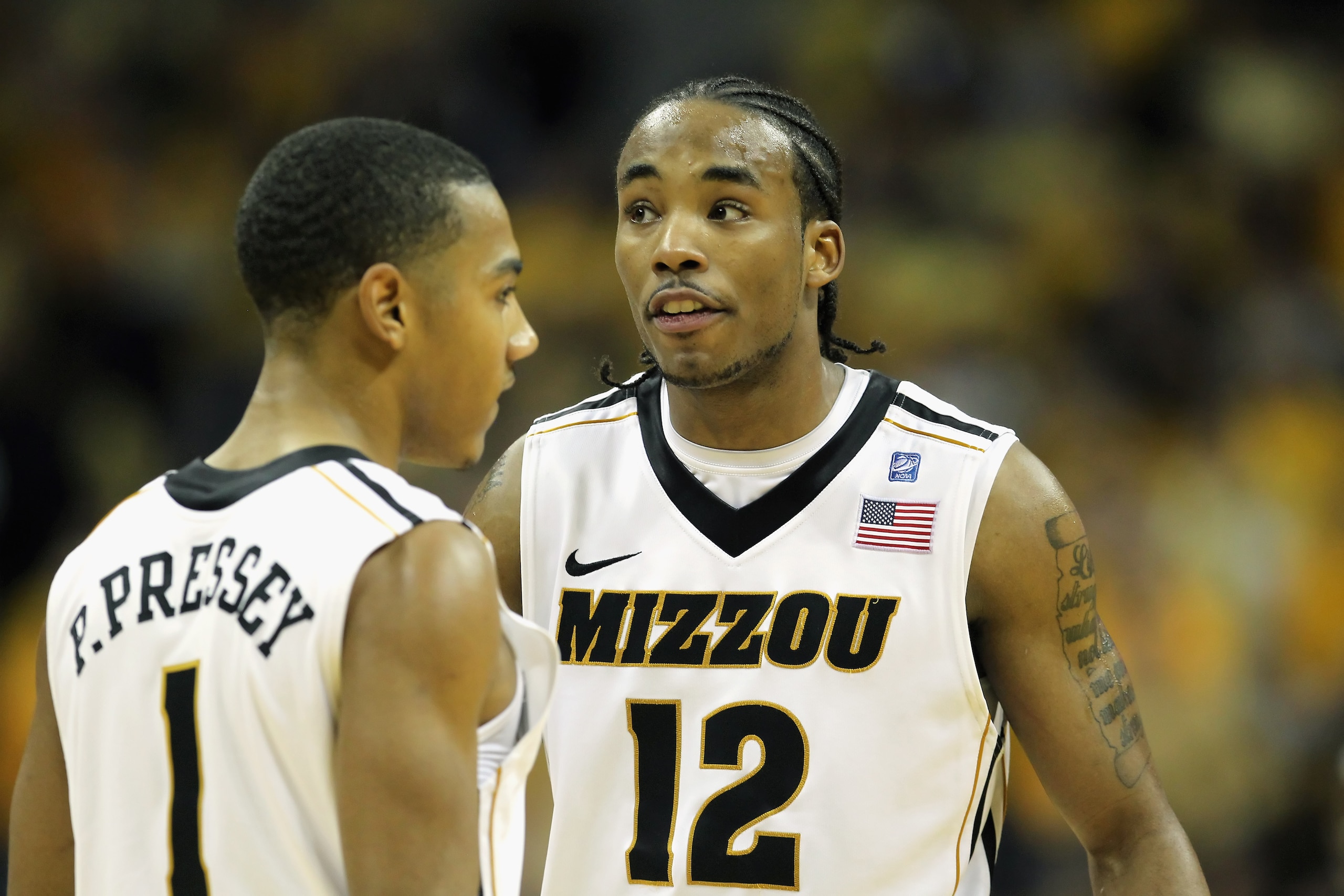 COLUMBIA, MO - JANUARY 17:  Marcus Denmon #12 of the Missouri Tigers talks with Phil Pressey #1 during a timeout in the game against the Kansas State Wildcats on January 17, 2011 at Mizzou Arena in Columbia, Missouri.  (Photo by Jamie Squire/Getty Images)