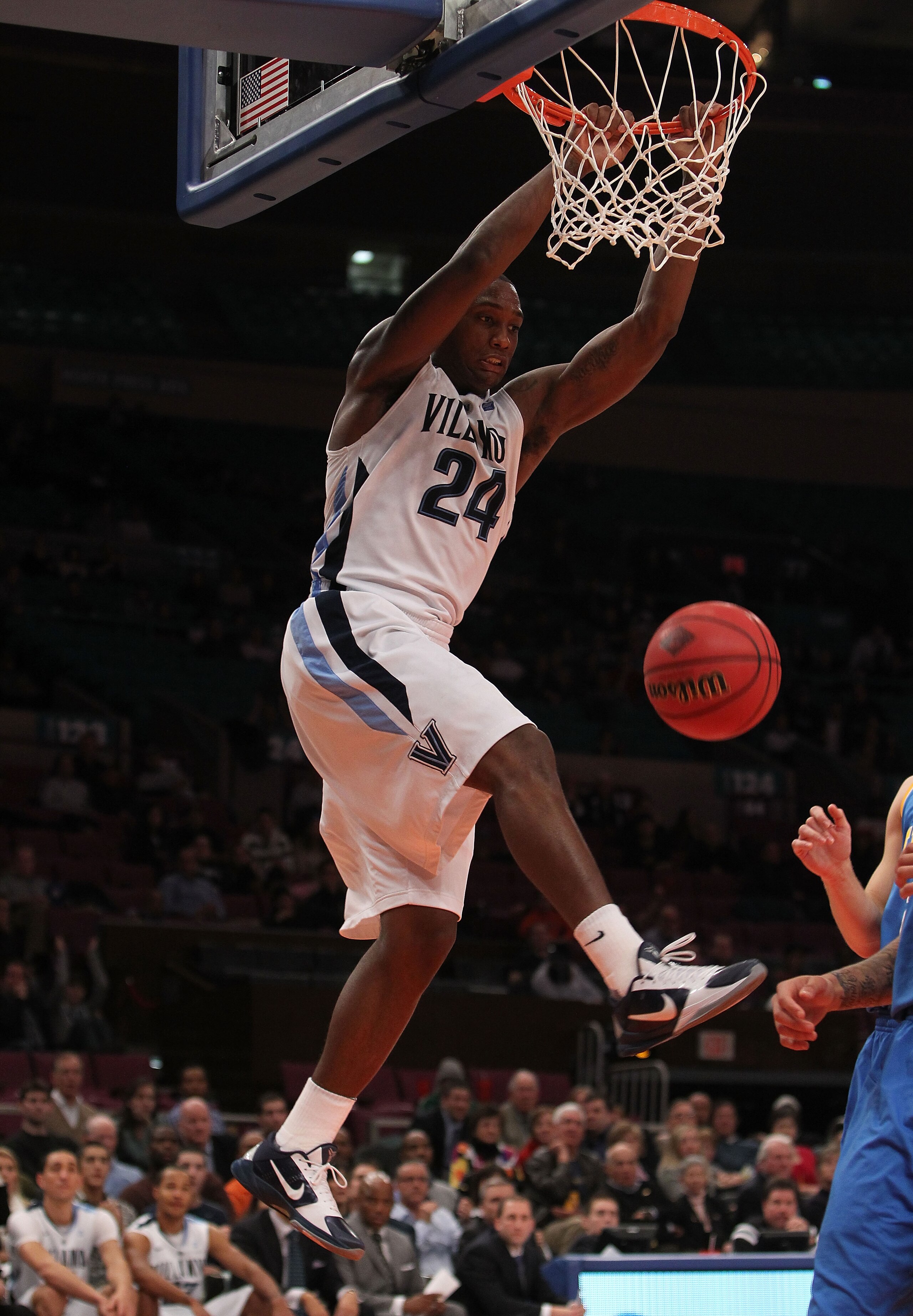 NEW YORK - NOVEMBER 24:  Corey Stokes #24 of the Villanova Wildcats dunks against the UCLA Bruins during their preseason NIT semifinal at Madison Square Garden on November 24, 2010 in New York City.  (Photo by Nick Laham/Getty Images)