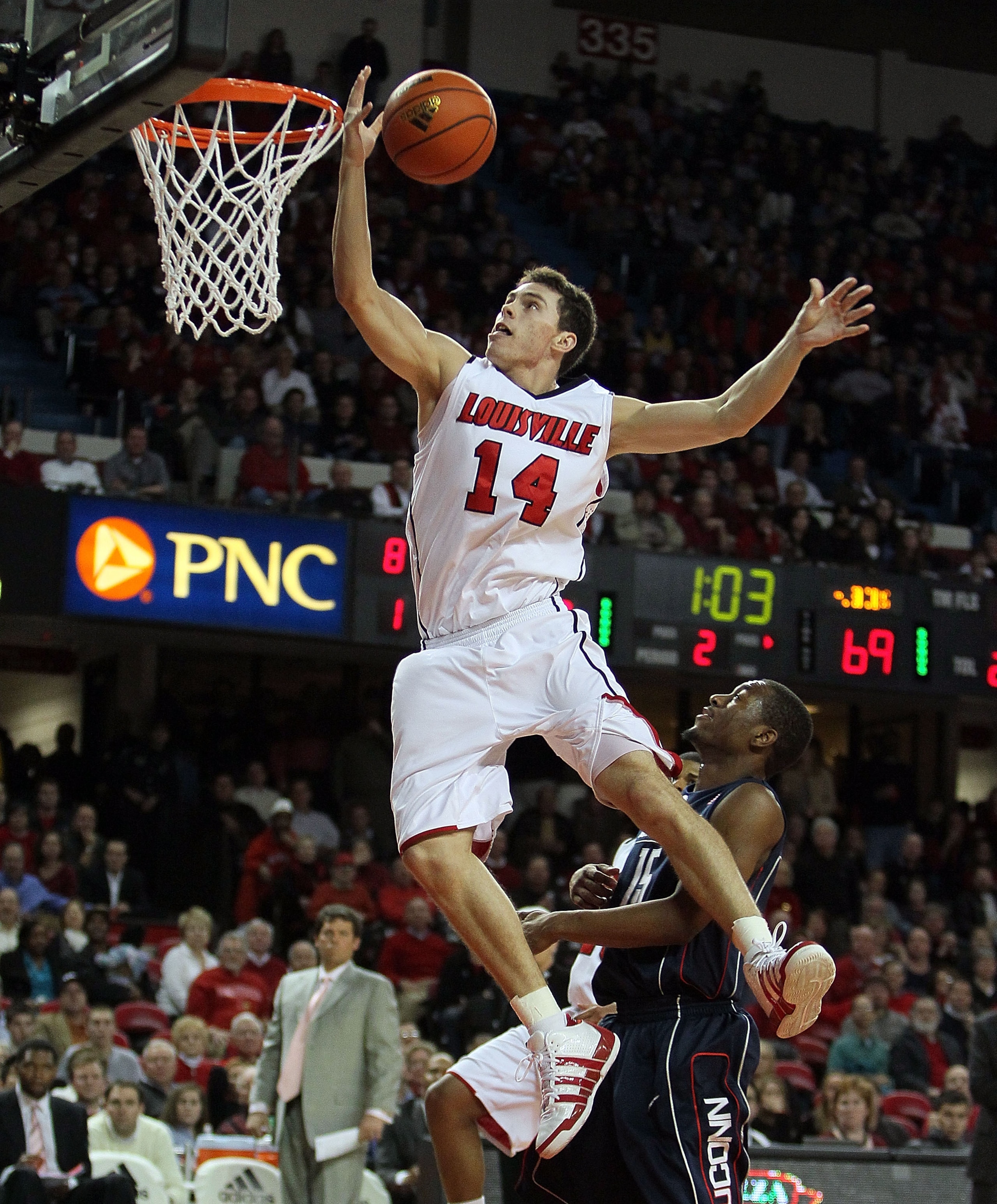 LOUISVILLE, KY - FEBRUARY 01:  Kyle Kuric #14 of the Louisville Cardinals shoots the ball during the Big East Conference game against the Connecticut Huskies on February 1, 2010 at Freedom Hall in Louisville, Kentucky.  Louisville won 82-69.  (Photo by An