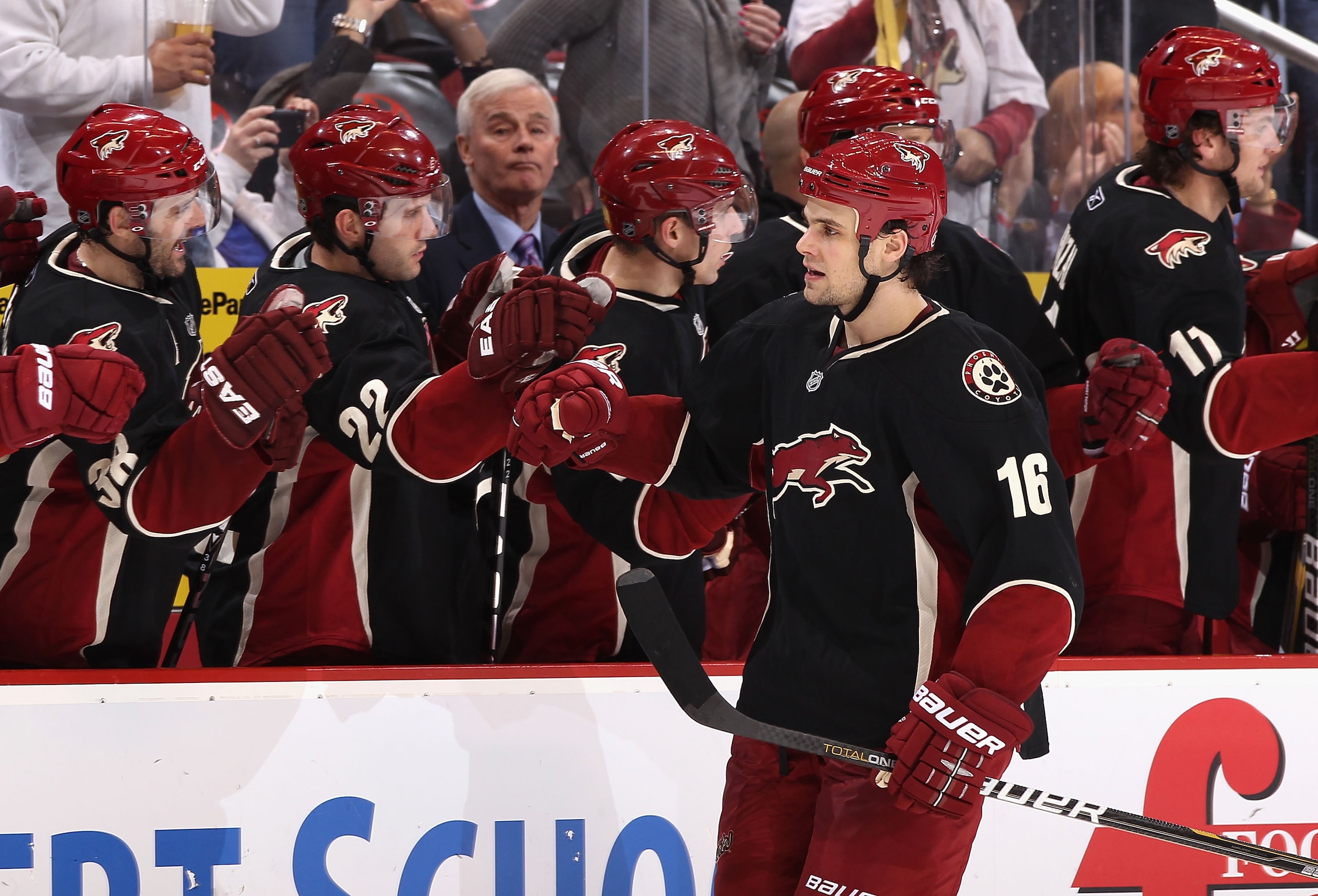 GLENDALE, AZ - MARCH 01:  Rostislav Klesla #16 of the Phoenix Coyotes celebrates with teammates on the bench after scoring a third period goal against the Dallas Stars during the NHL game at Jobing.com Arena on March 1, 2011 in Glendale, Arizona. The Star