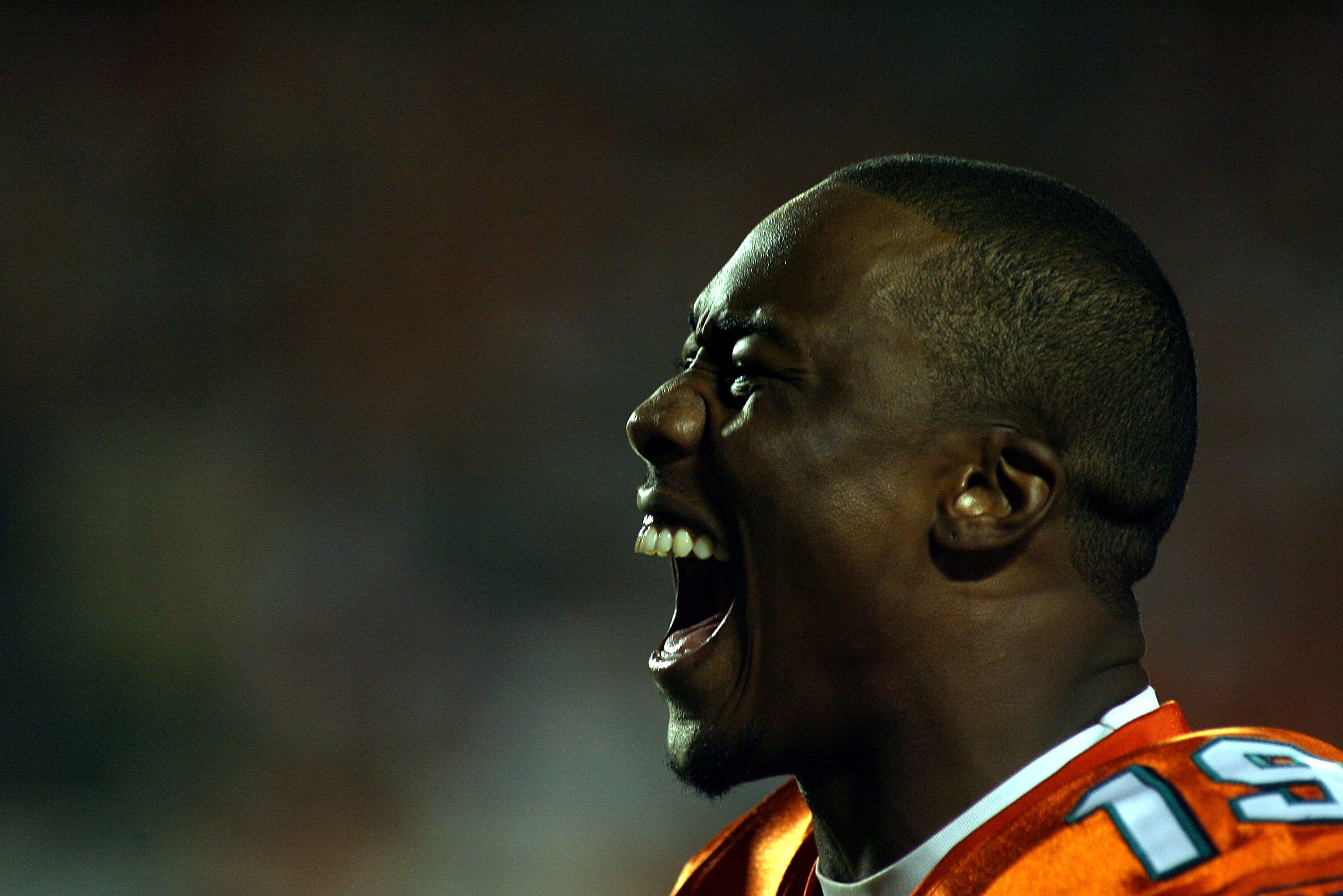 MIAMI - SEPTEMBER 26:  Receiver Brandon Marshall #19 of the Miami Dolphins shouts during a game against the New York Jets at Sun Life Stadium on September 26, 2010 in Miami, Florida.  (Photo by Marc Serota/Getty Images)