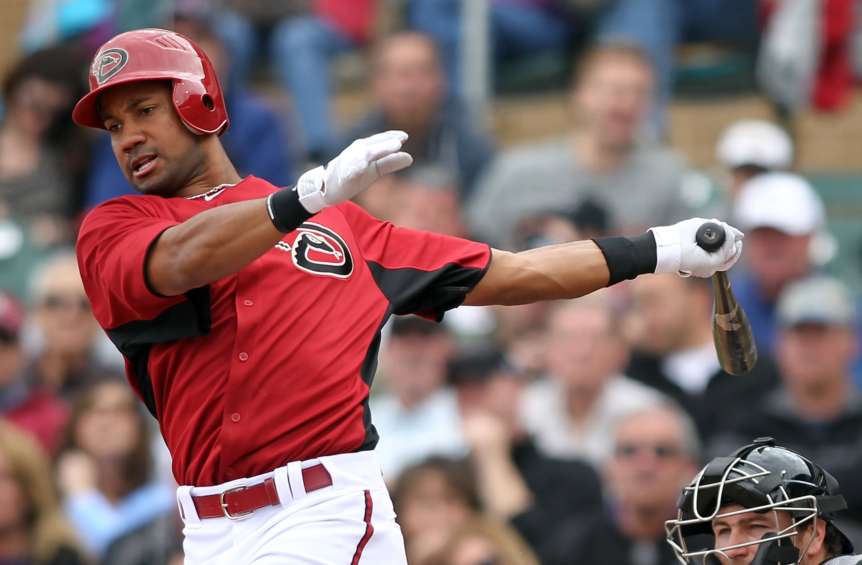 SCOTTSDALE, AZ - FEBRUARY 26:  Chris Young #24 of the Arizona Diamondbacks swings his bat against the Colorado Rockies at Salt River Fields on February 26, 2011 in Scottsdale, Arizona..  (Photo by Jonathan Ferrey/Getty Images)