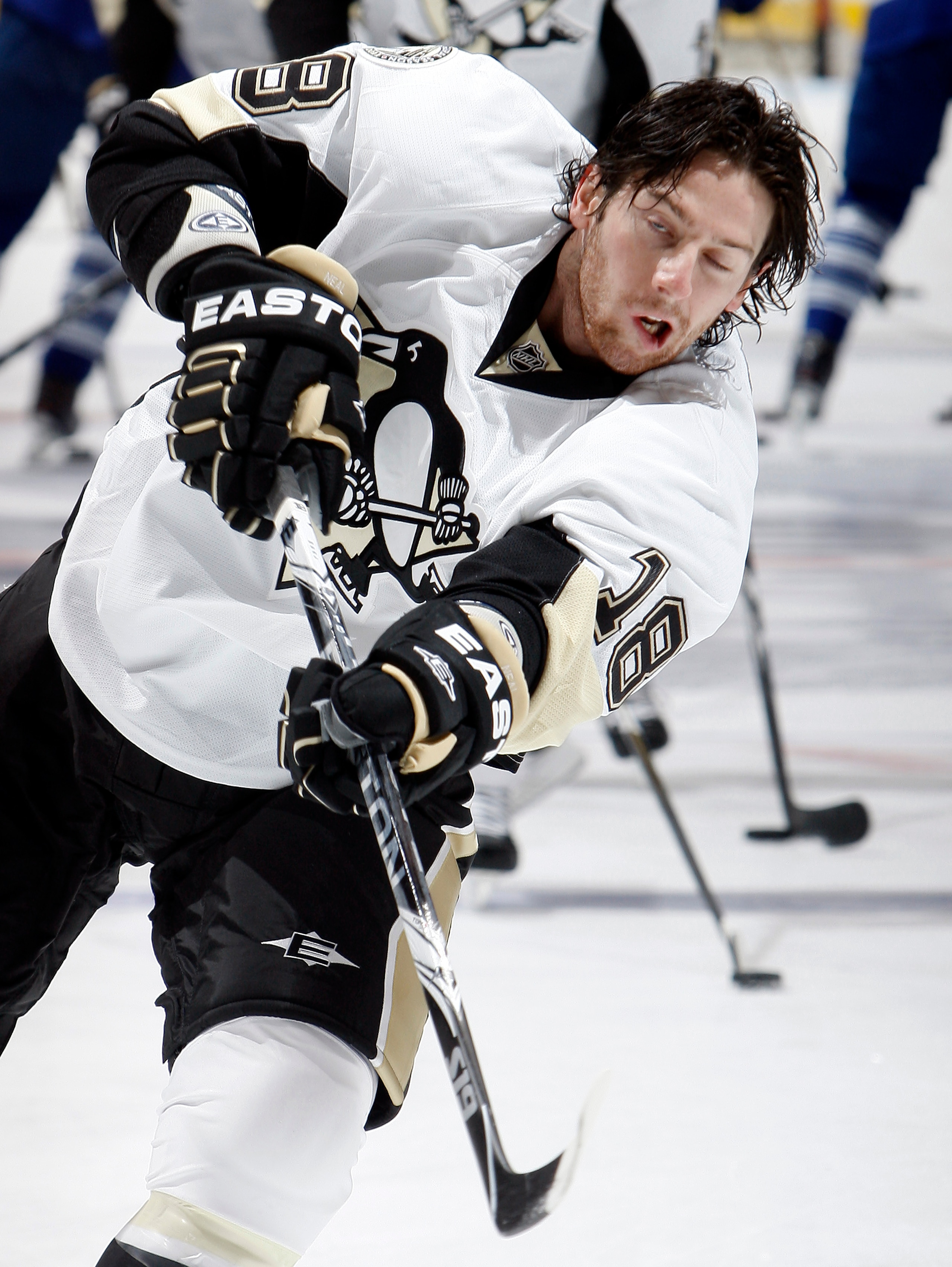 TORONTO, CANADA - FEBRUARY 26: James Neal #18 of the Pittsburgh Penguins puts all into his shot as he shoots during warmup before game action against the Toronto Maple Leafs at the Air Canada Centre February 26, 2011 in Toronto, Ontario, Canada. (Photo by