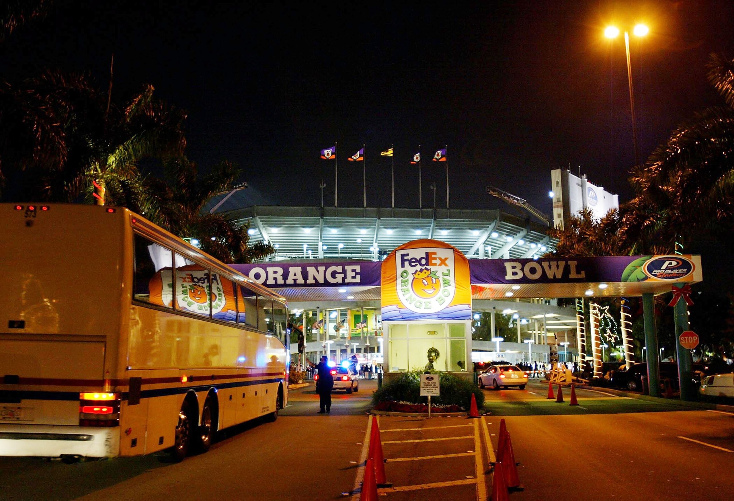 MIAMI - JANUARY 1:   A University of Miami team bus pulls into the stadium prior to the Fed Ex Orange Bowl between the Florida State Seminoles and the Miami Hurricanes January 1, 2004 at Pro Player Stadium in Miami, Florida. (Photo by Jamie Squire/Getty I