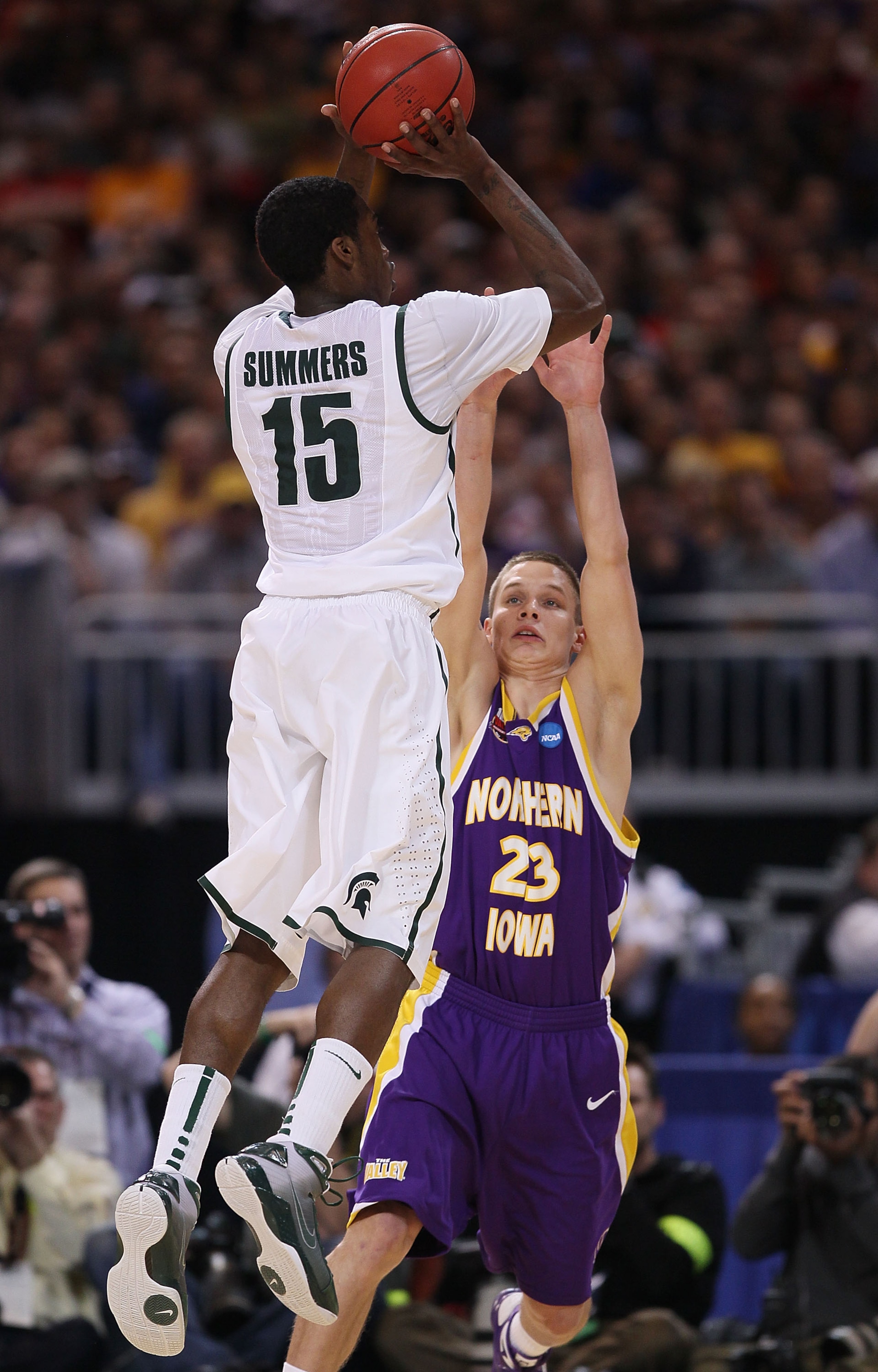 ST. LOUIS - MARCH 26: Marc Sonnen #23 of the Northern Iowa Panthers tries to block a shot by Durrell Summers #15 of the Michigan State Spartans during the midwest regional semifinal of the 2010 NCAA men's basketball tournament at the Edward Jones Dome on ST. LOUIS - MARCH 26: Marc Sonnen #23 of the Northern Iowa Panthers tries to block a shot by Durrell Summers #15 of the Michigan State Spartans during the midwest regional semifinal of the 2010 NCAA men's basketball tournament at the Edward Jones Dome on