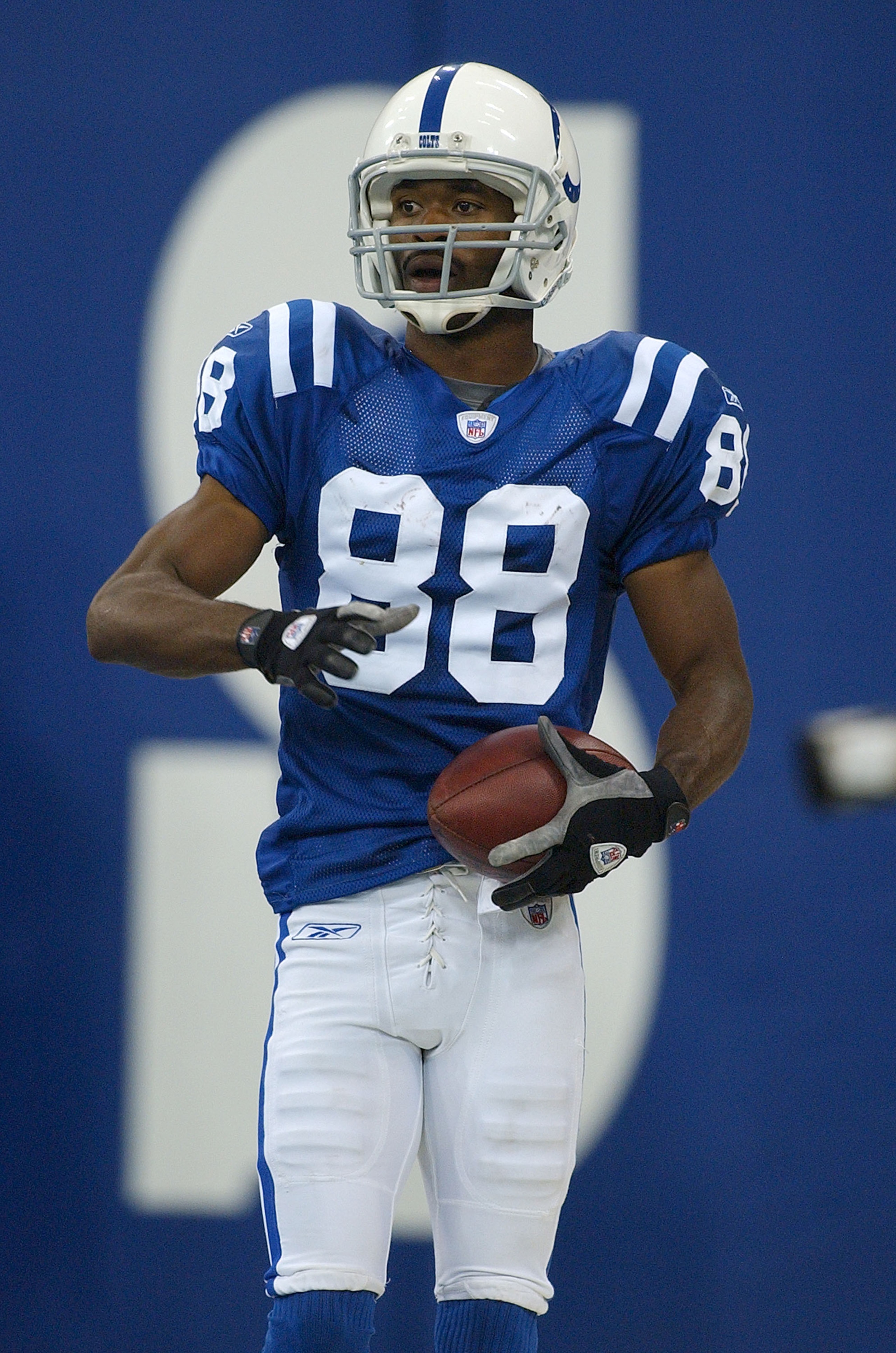 INDIANAPOLIS - SEPTEMBER 26: Marvin Harrison #88 of the Indianapolis Colts celebrates a touchdown catch against the Green Bay Packers at the RCA Dome on September 26, 2004 in Indianapolis, Indiana. (Photo by Jonathan Daniel/Getty Images)