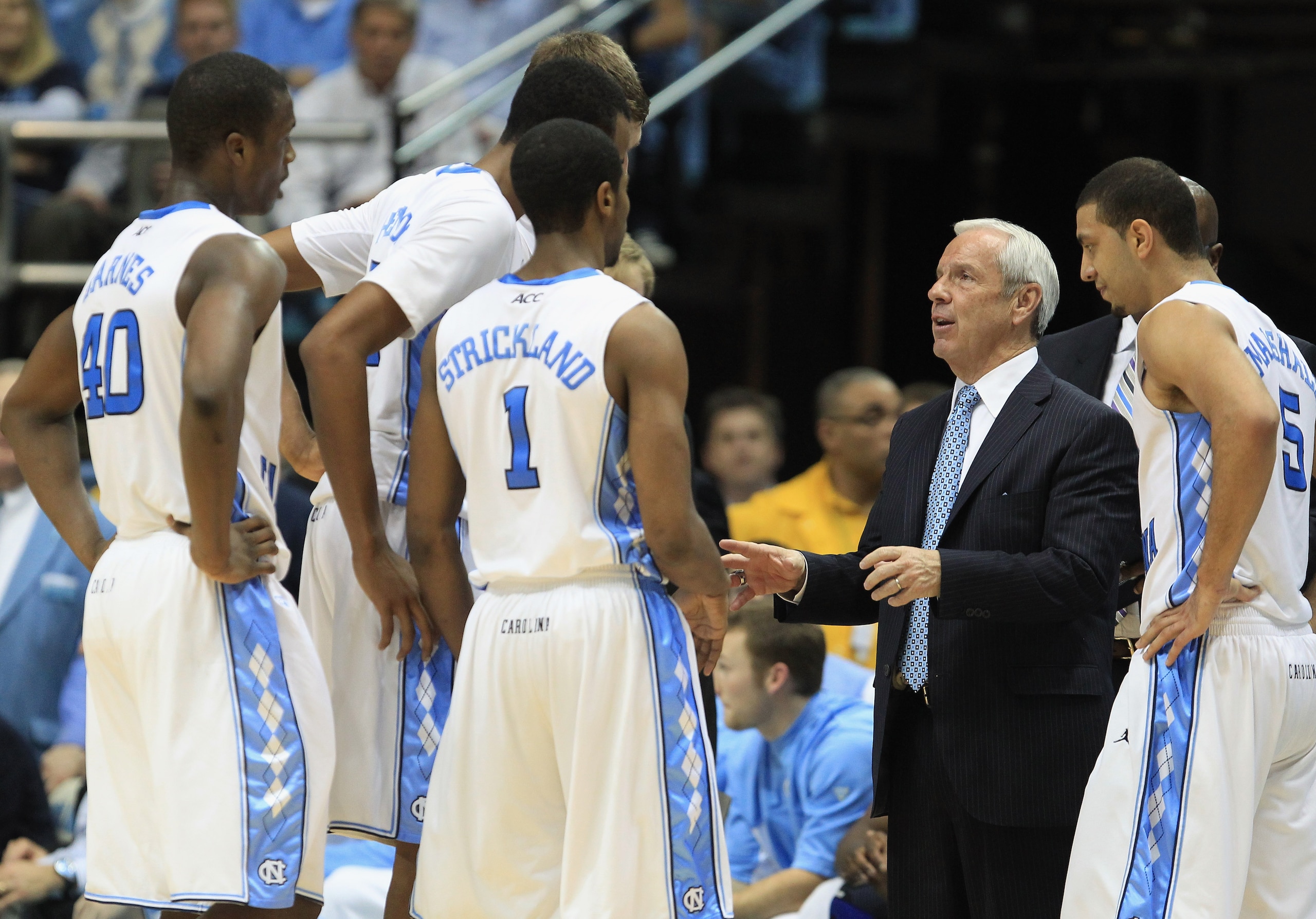 CHAPEL HILL, NC - FEBRUARY 27:  Head coach Roy Williams of the North Carolina Tar Heels talks to his team during their game against the Maryland Terrapins at the Dean E. Smith Center on February 27, 2011 in Chapel Hill, North Carolina.  (Photo by Streeter