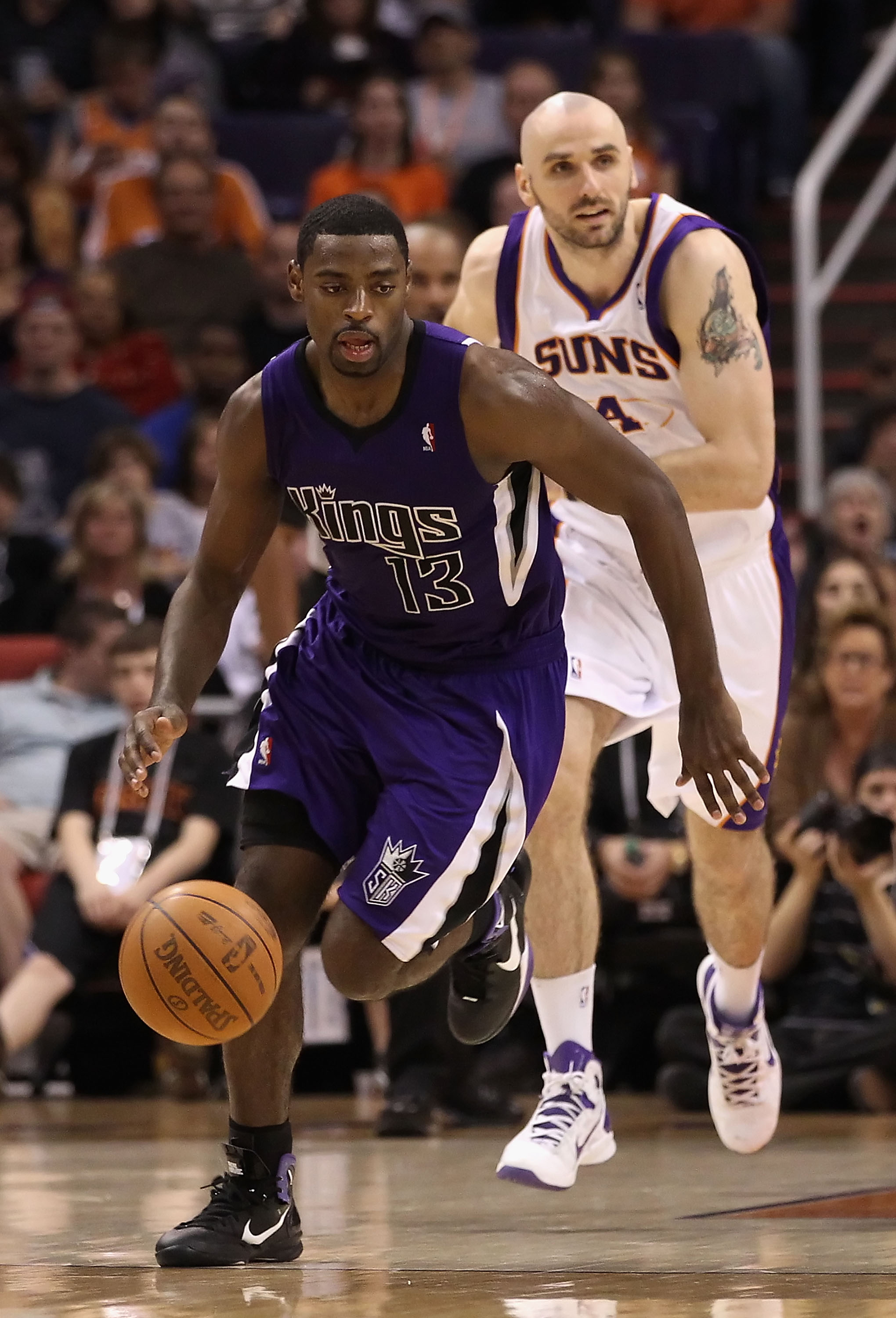 PHOENIX, AZ - FEBRUARY 13: Tyreke Evans #13 of the Sacramento Kings handles the ball during the NBA game against the Phoenix Suns at US Airways Center on February 13, 2011 in Phoenix, Arizona. NOTE TO USER: User expressly acknowledges and agrees that, b PHOENIX, AZ - FEBRUARY 13: Tyreke Evans #13 of the Sacramento Kings handles the ball during the NBA game against the Phoenix Suns at US Airways Center on February 13, 2011 in Phoenix, Arizona. NOTE TO USER: User expressly acknowledges and agrees that, b