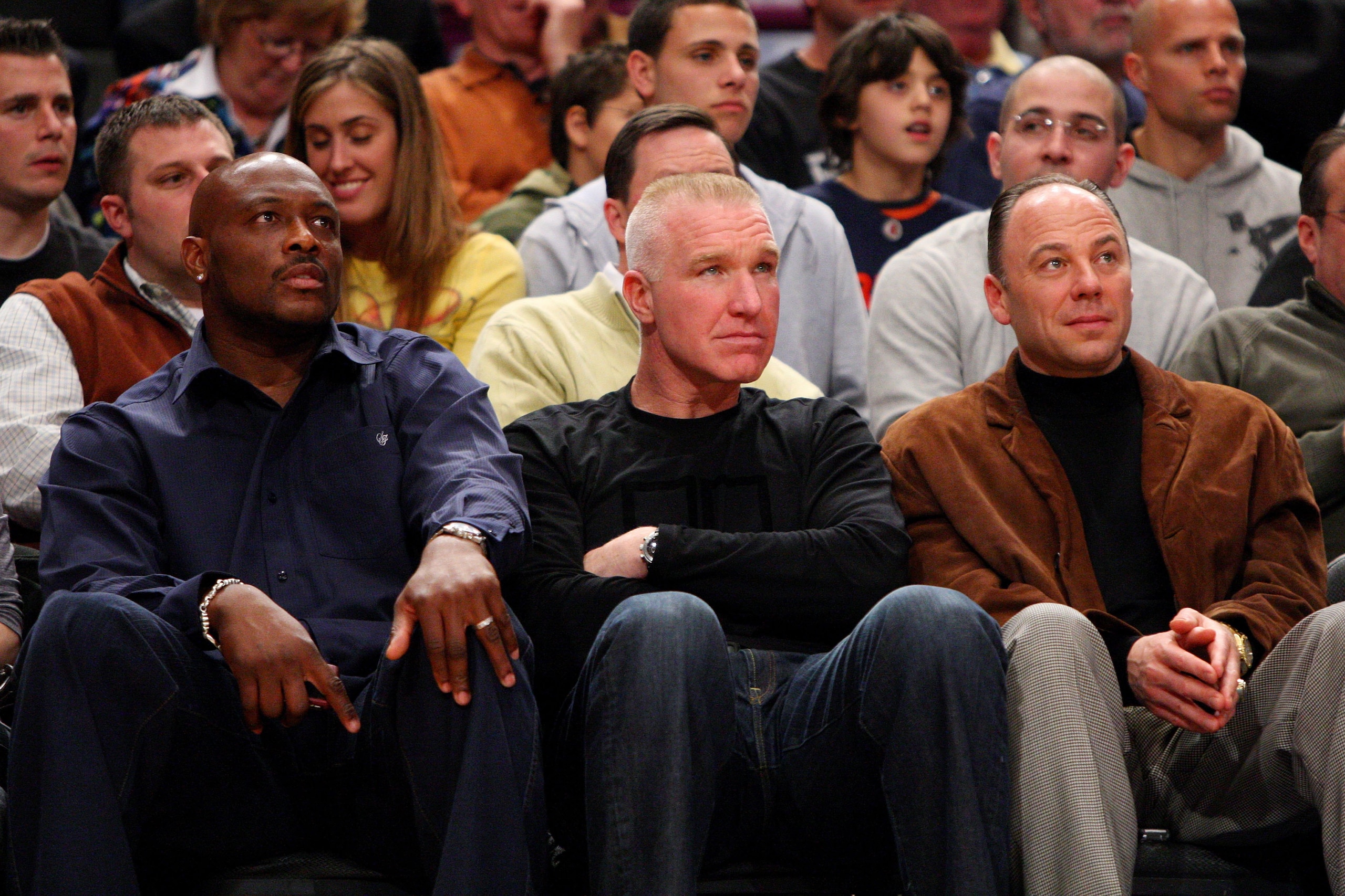 NEW YORK - MARCH 13:  (L-R) Mitch Richmond, Chris Mullin and Barry Rohrssen look on as the West Virginia Mountaineers take on the Syracuse Orange during the semifinal round of the Big East Tournament at Madison Square Garden on March 13, 2009 in New York