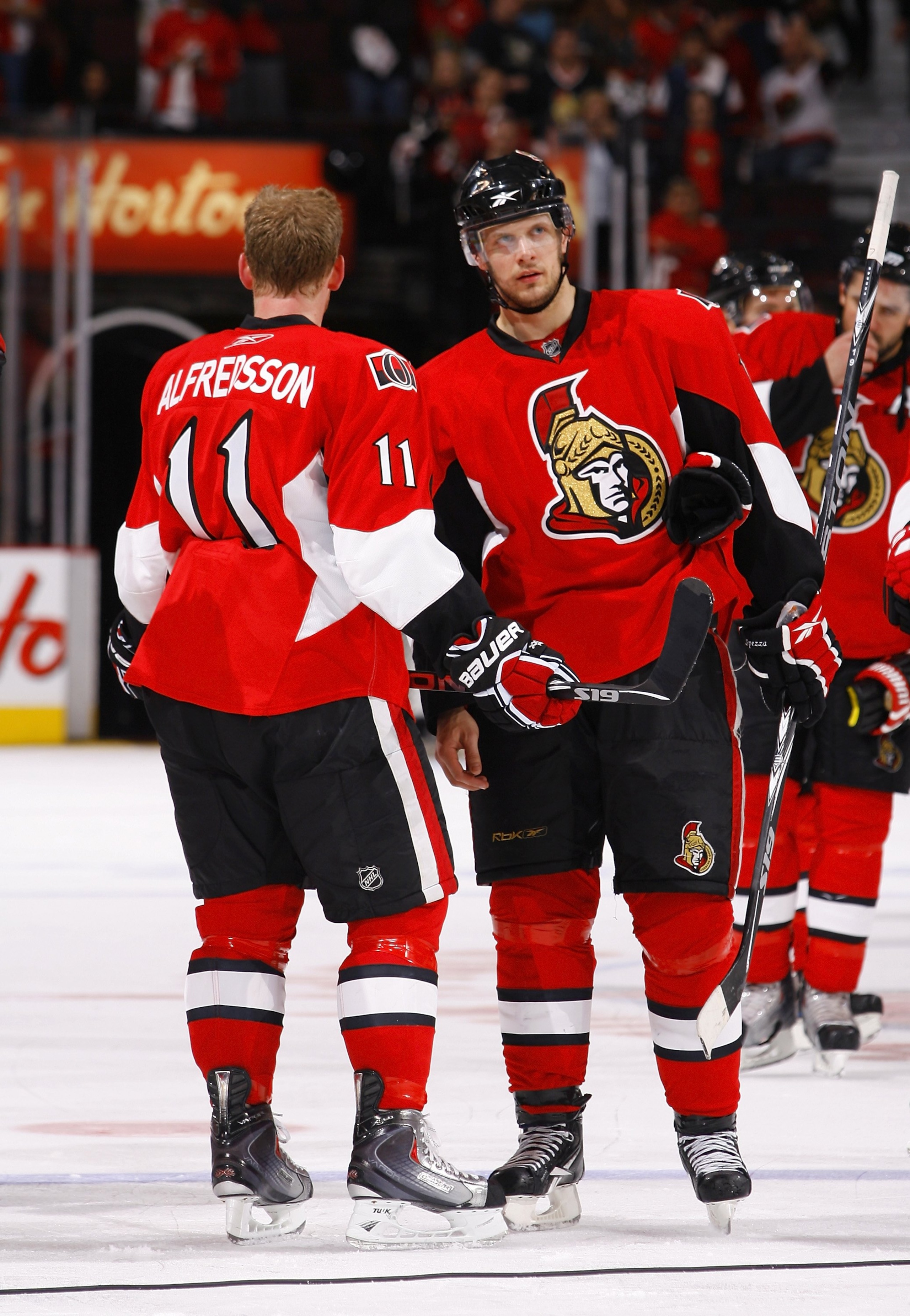 OTTAWA, ON - APRIL 24:  Jason Spezza #19 and Daniel Alfredsson #11 of the Ottawa Senators talk during a break in action against the Pittsburgh Penguins in Game 6 of the Eastern Conference Quaterfinals of the 2010 Stanley Cup Playoffs at Scotiabank Place o