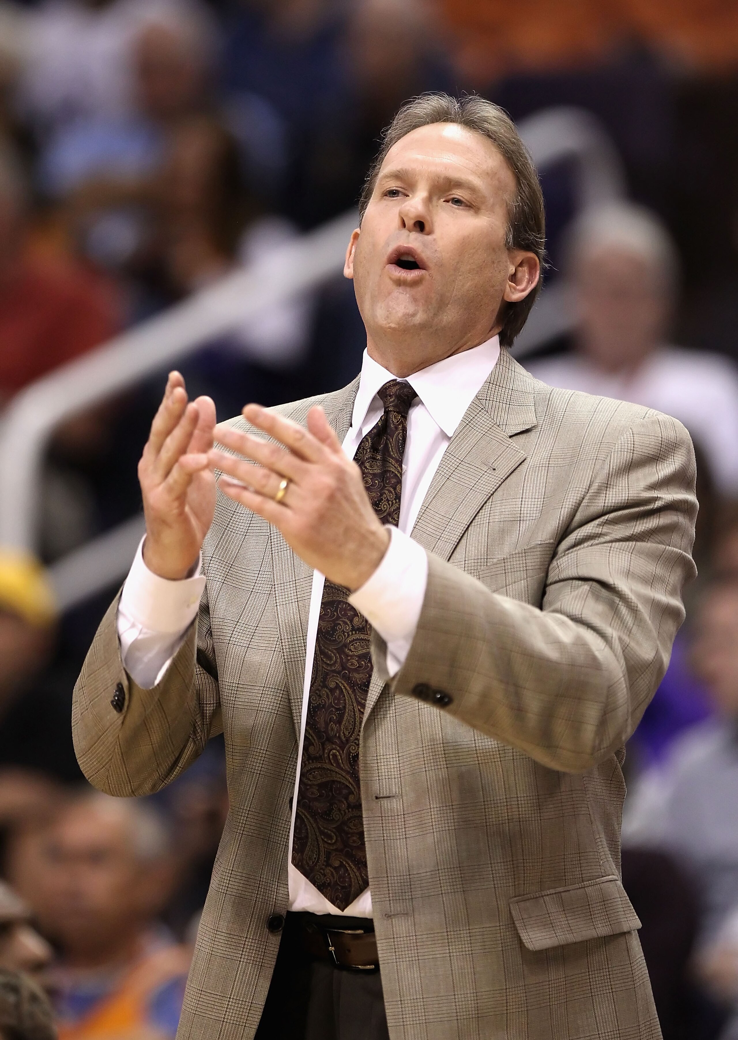 PHOENIX - DECEMBER 15:  Head coach Kurt Rambis of the Minnesota Timberwolves reacts during the NBA game against the Phoenix Suns at US Airways Center on December 15, 2010 in Phoenix, Arizona. The Suns defeated the Timberwolves 128-122.  NOTE TO USER: User