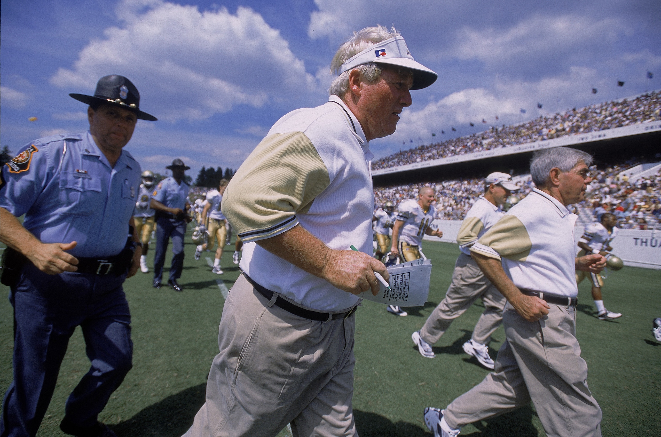 8 Sep 2001: Head Coach George O''Leary of the Georgia Tech Yellow Jackets heads into the locker room during halftime of the game against the Navy Midshipmen at Memorial Stadium in Annapolis, Maryland. The Yellow Jackets defeated the Midshipmen 70-7. Mand 8 Sep 2001: Head Coach George O''Leary of the Georgia Tech Yellow Jackets heads into the locker room during halftime of the game against the Navy Midshipmen at Memorial Stadium in Annapolis, Maryland. The Yellow Jackets defeated the Midshipmen 70-7. Mand