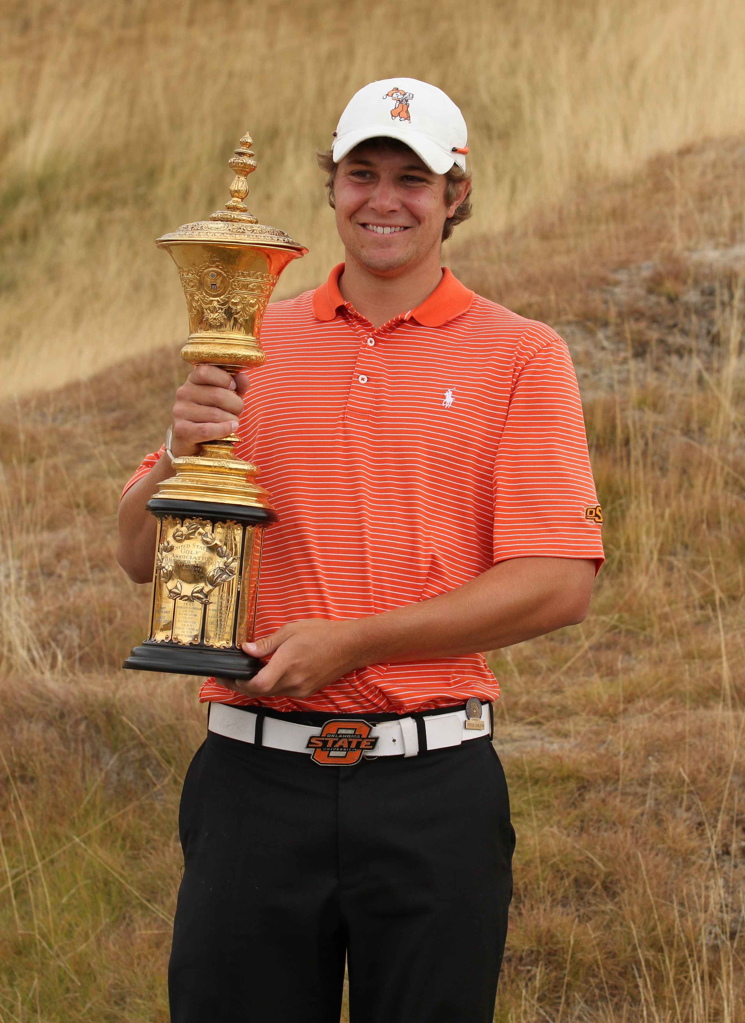 UNIVERSITY PLACE, WA - AUGUST 29:  Peter Uihlein holds the Havemeyer Trophy on the final day of the U.S. Amateur Golf Championship on August 29, 2010 at Chambers Bay in University Place, Washington. Uihlein won the 36 hole final 4 and 2. (Photo by Otto Gr